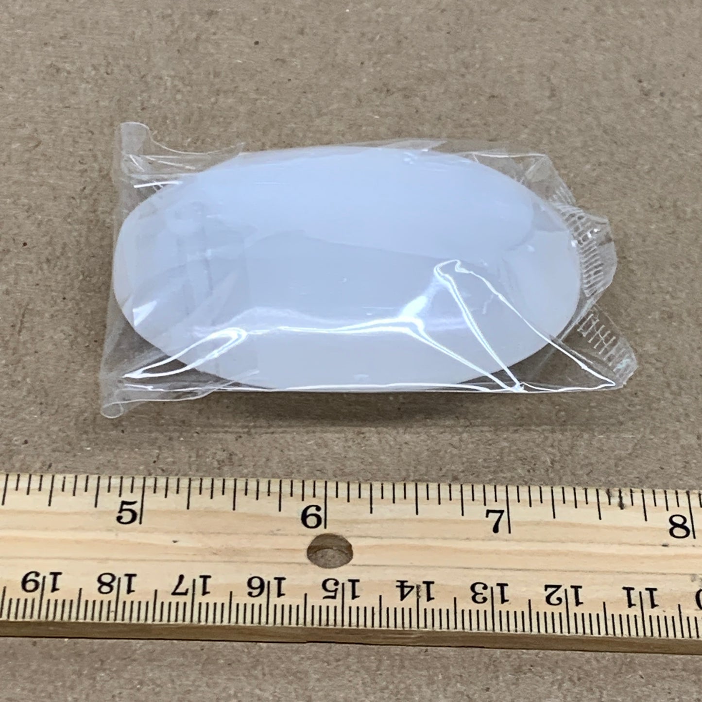 94g, 2.7"x2"x0.9", White Selenite Palmstone Crystal Pillow Reiki, B36383