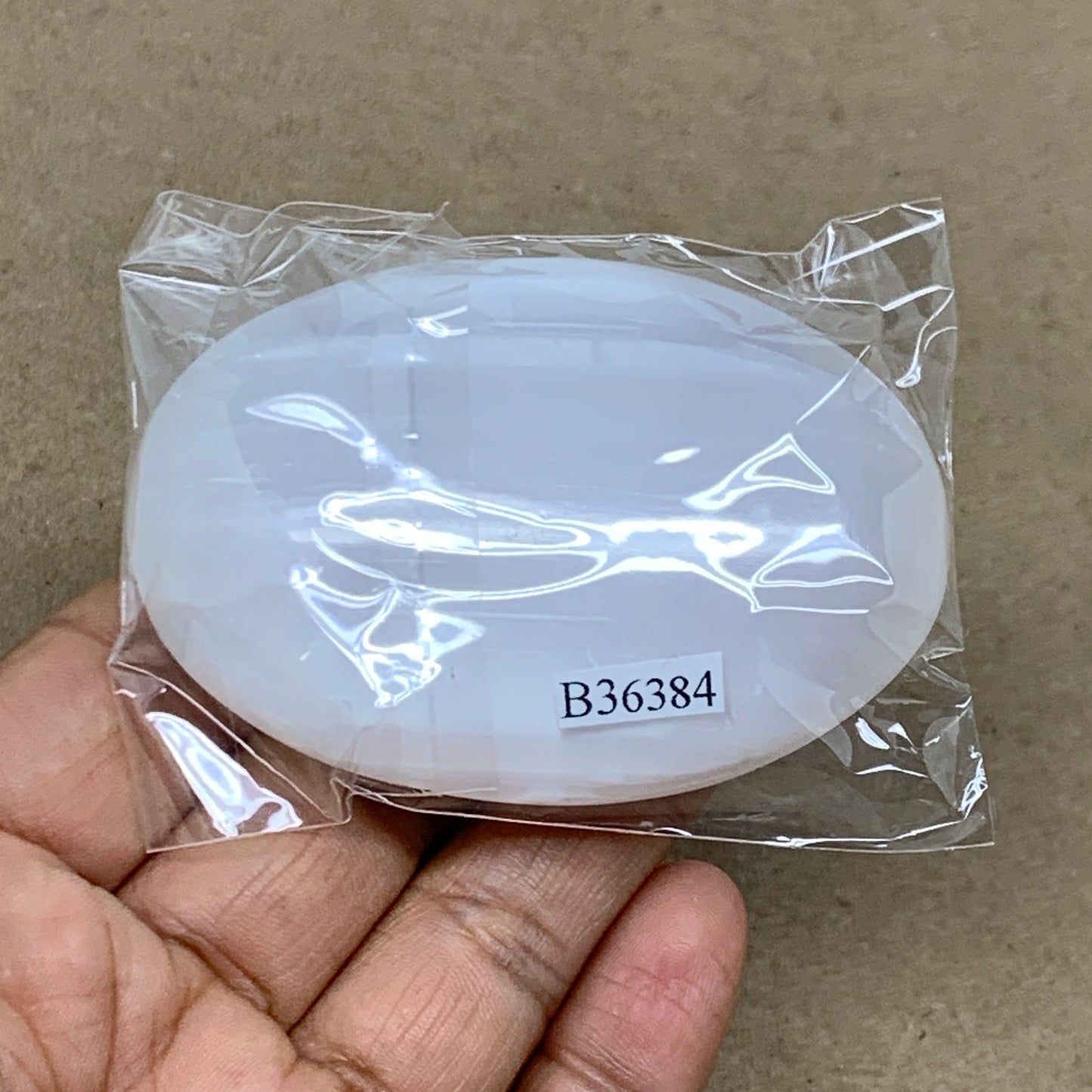 93g, 2.8"x1.9"x0.9", White Selenite Palmstone Crystal Pillow Reiki, B36384