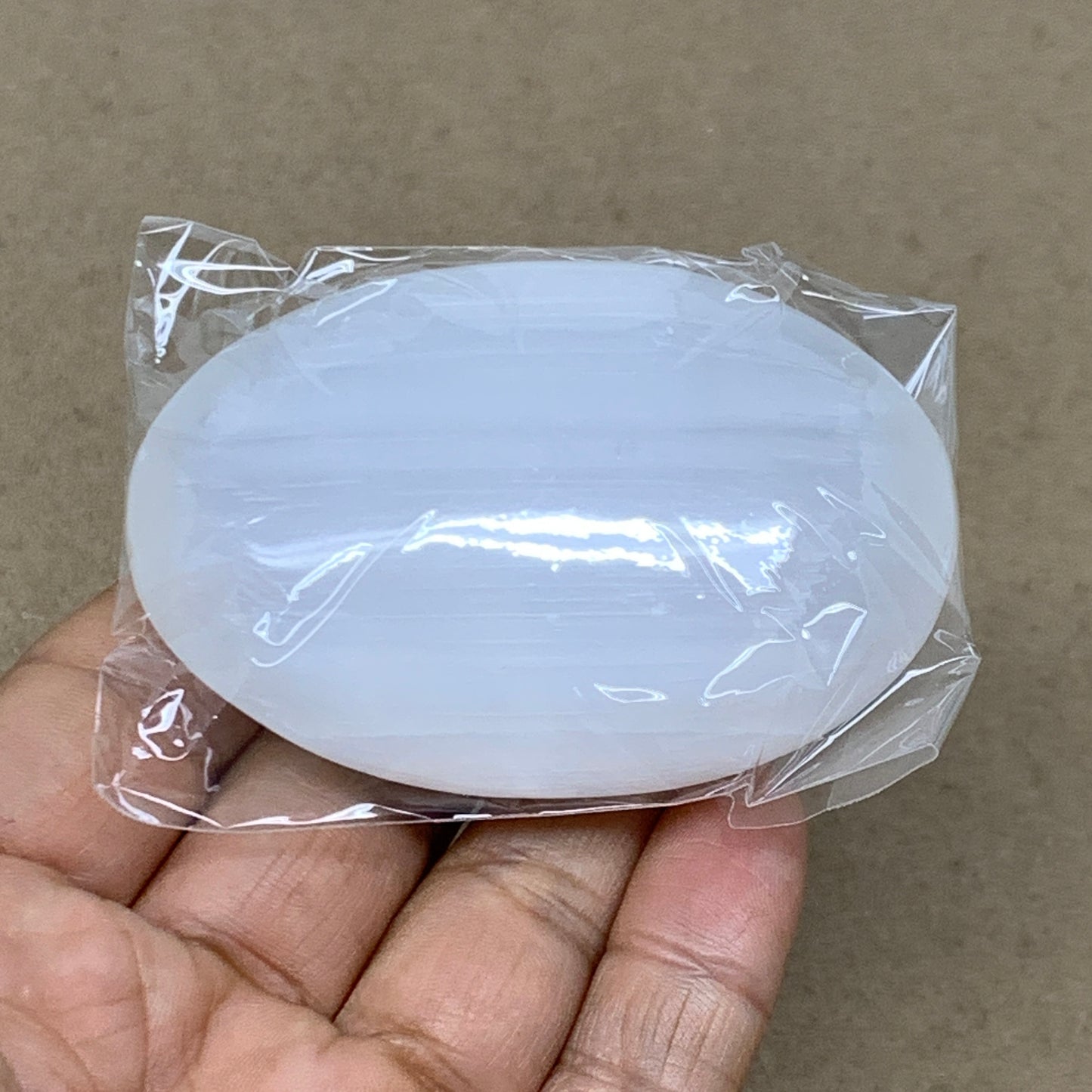 93g, 2.8"x1.9"x0.9", White Selenite Palmstone Crystal Pillow Reiki, B36384