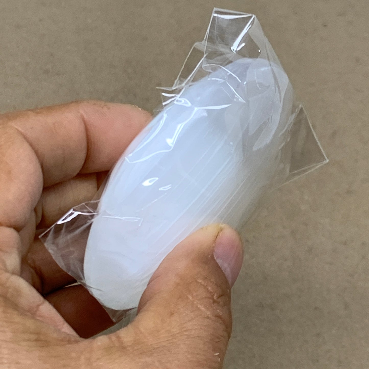 93g, 2.8"x1.9"x0.9", White Selenite Palmstone Crystal Pillow Reiki, B36384