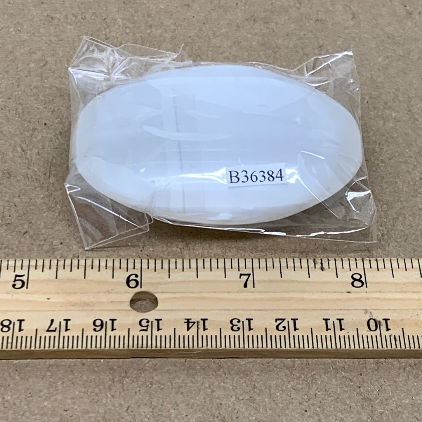 93g, 2.8"x1.9"x0.9", White Selenite Palmstone Crystal Pillow Reiki, B36384