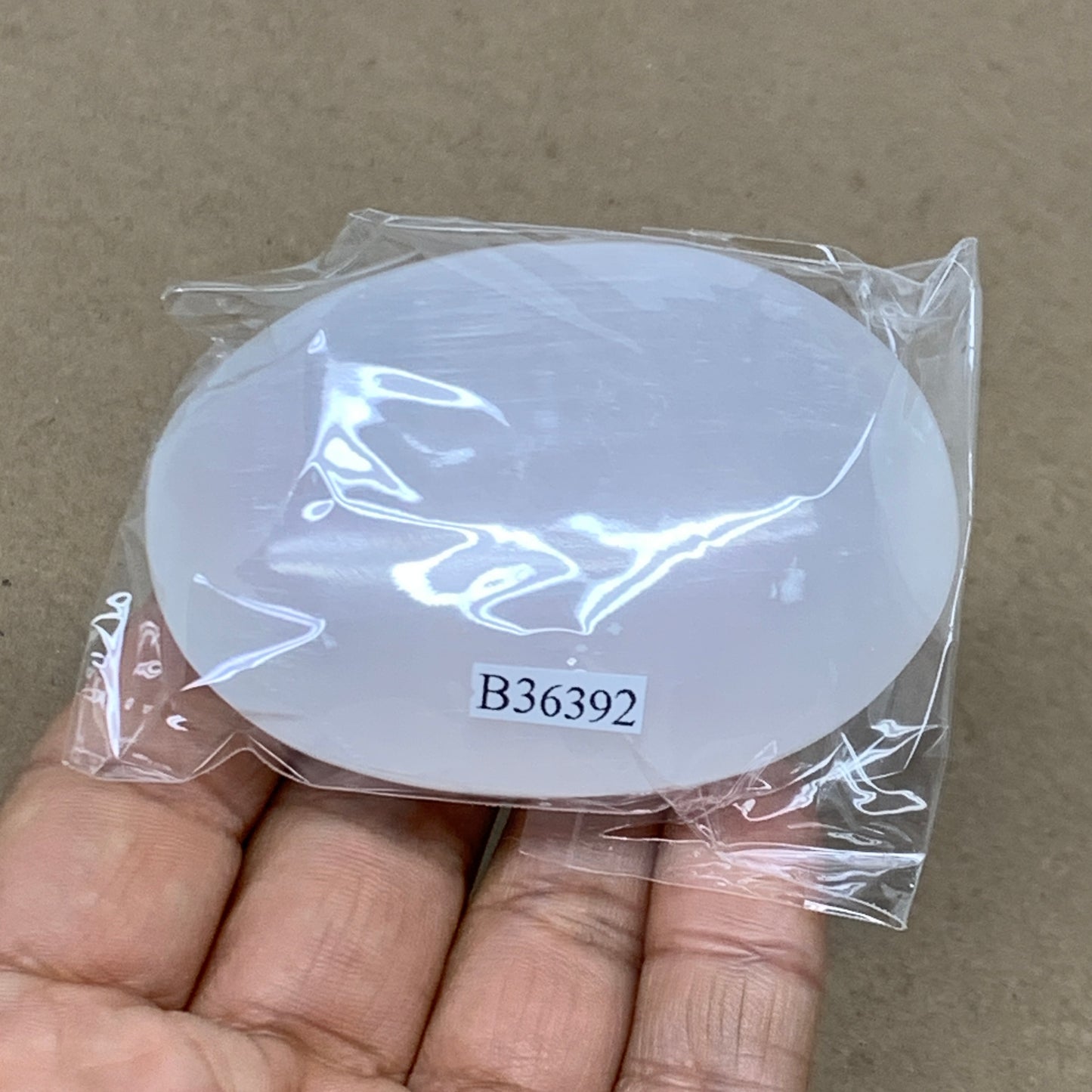 91g, 2.7"x1.9"x0.9", White Selenite Palmstone Crystal Pillow Reiki, B36392