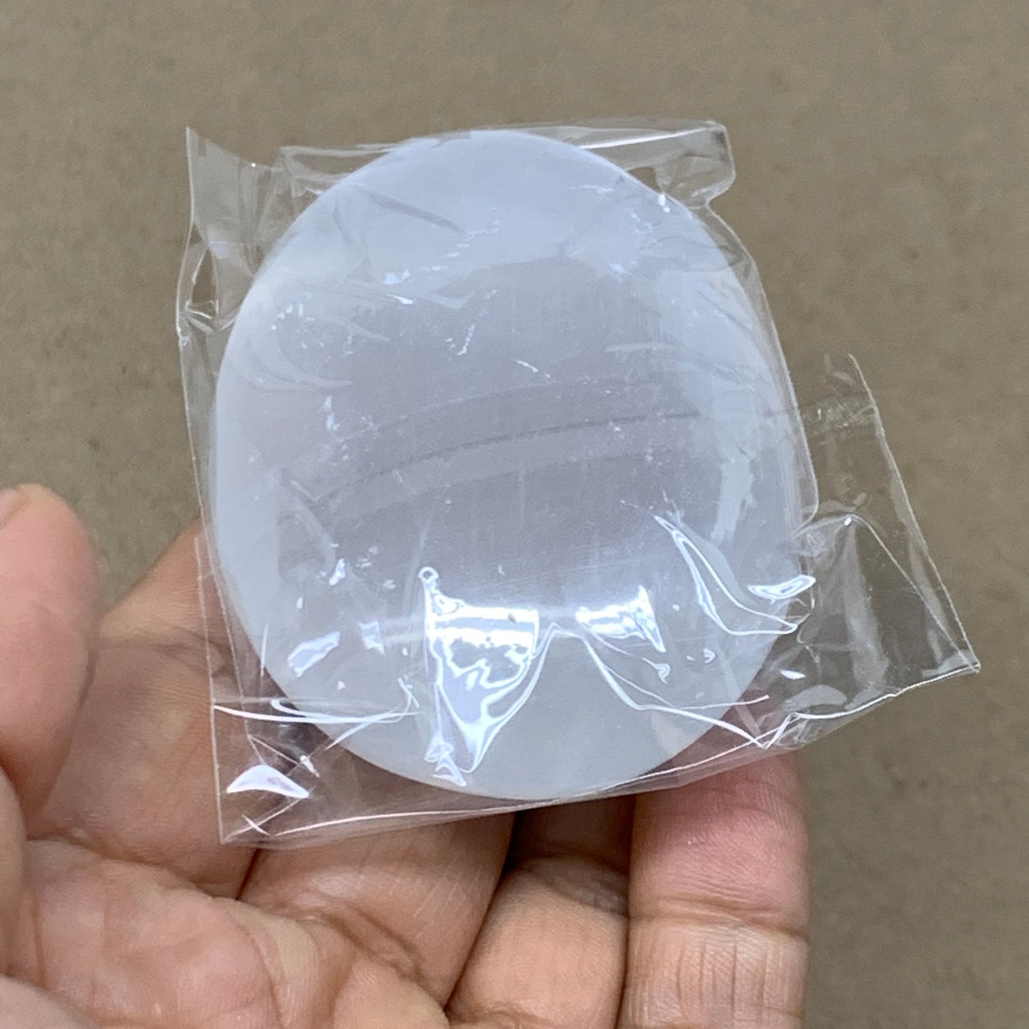 91g, 2.7"x1.9"x0.9", White Selenite Palmstone Crystal Pillow Reiki, B36392