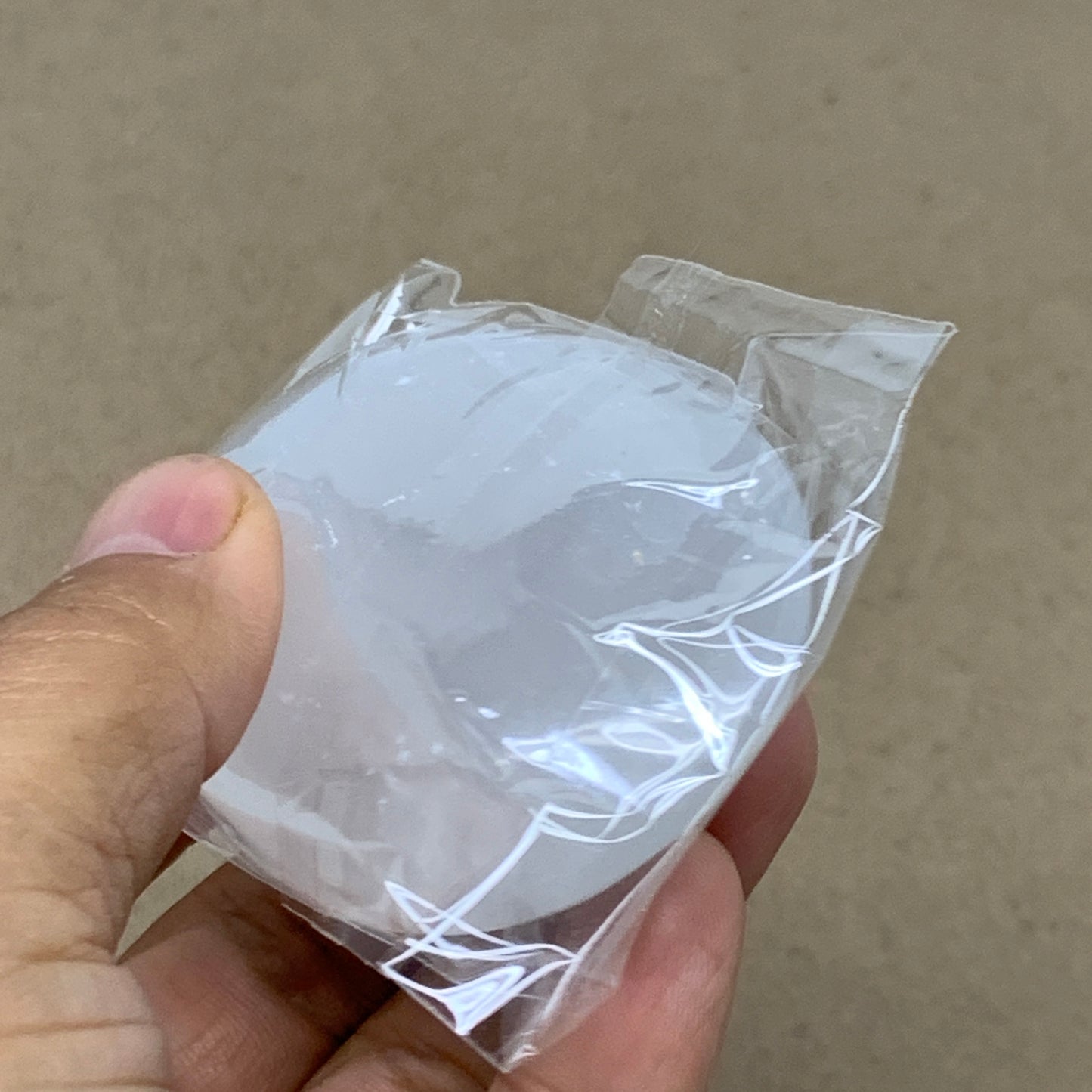 91g, 2.7"x1.9"x0.9", White Selenite Palmstone Crystal Pillow Reiki, B36392