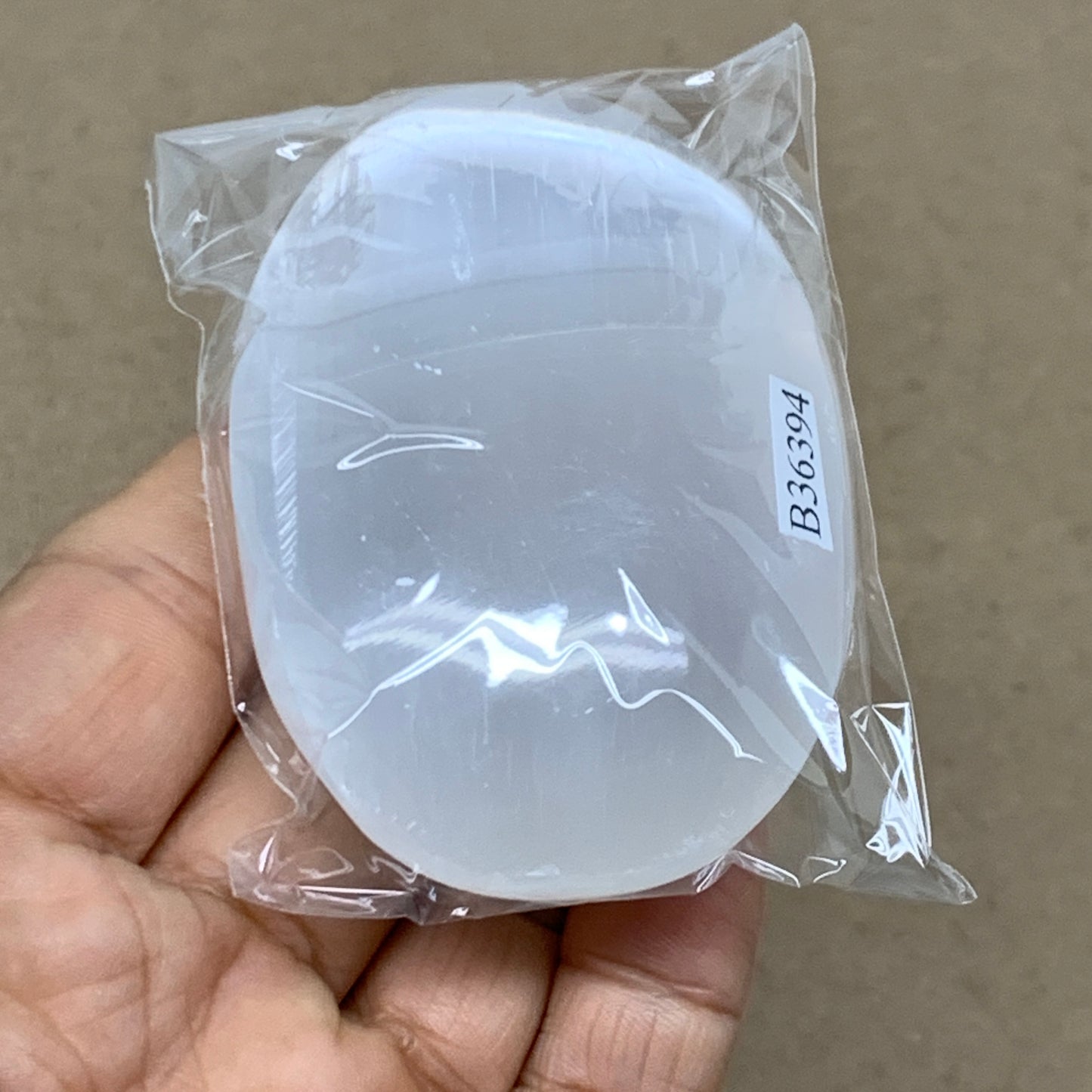 98g, 2.8"x1.9"x0.9", White Selenite Palmstone Crystal Pillow Reiki, B36394