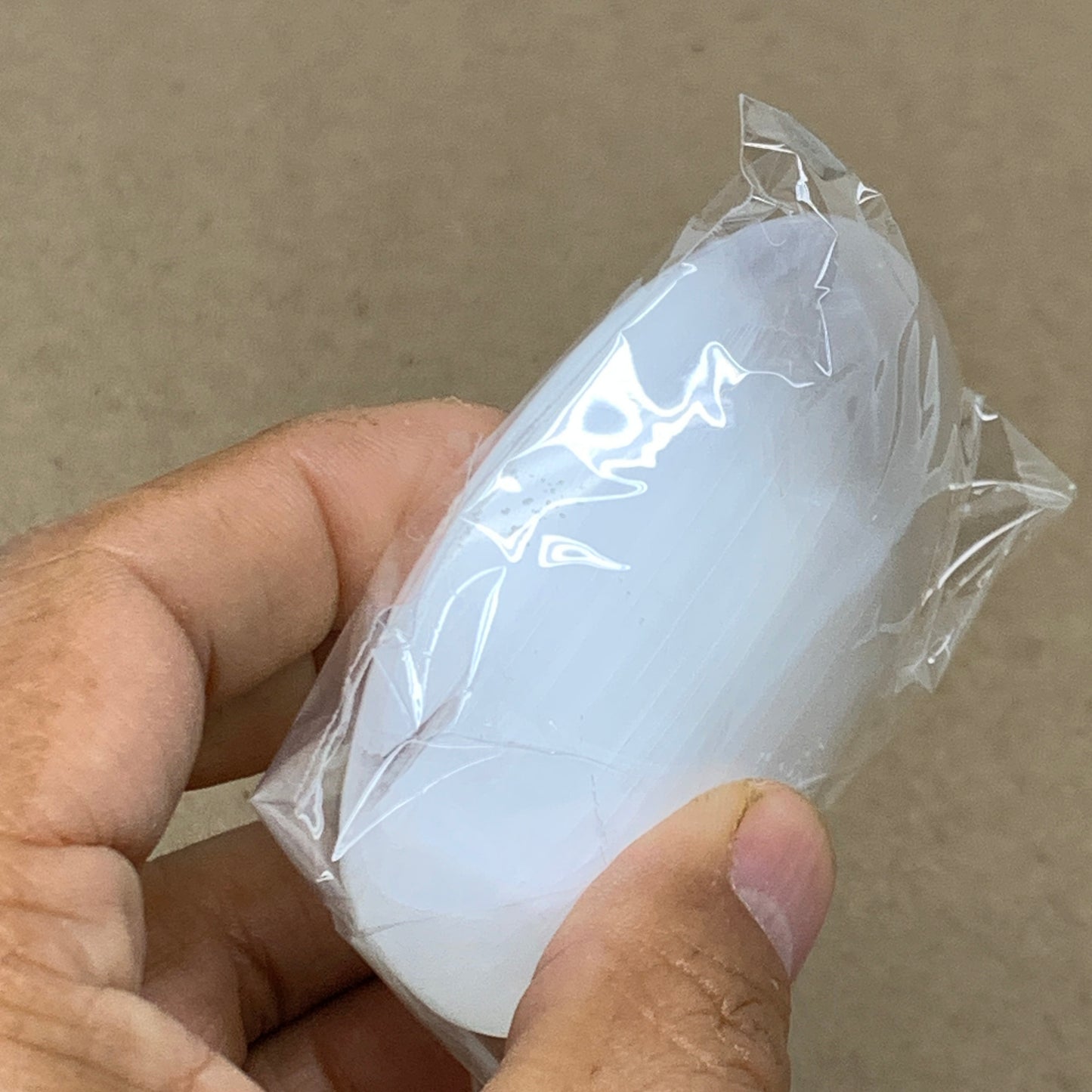 98g, 2.8"x1.9"x0.9", White Selenite Palmstone Crystal Pillow Reiki, B36394