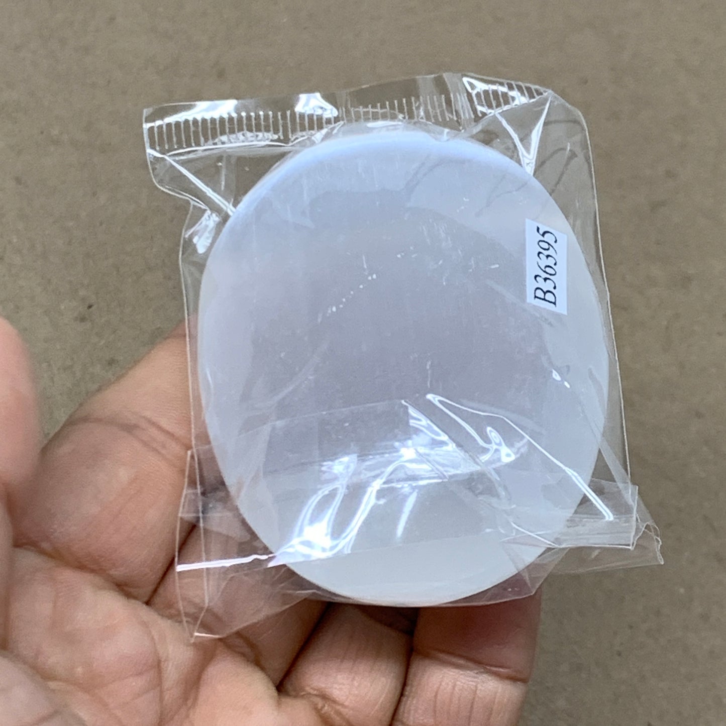 98g, 2.7"x1.9"x0.9", White Selenite Palmstone Crystal Pillow Reiki, B36395