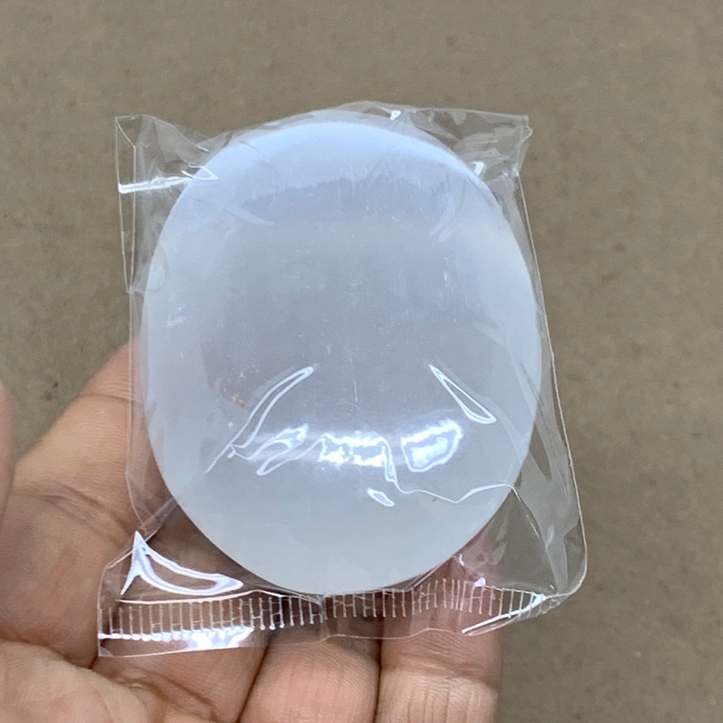 98g, 2.7"x1.9"x0.9", White Selenite Palmstone Crystal Pillow Reiki, B36395