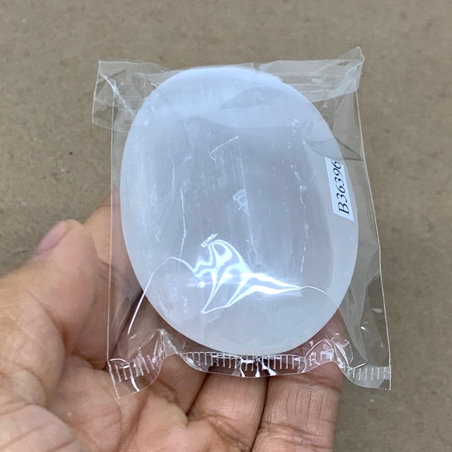 88g, 2.8"x1.9"x0.9", White Selenite Palmstone Crystal Pillow Reiki, B36396