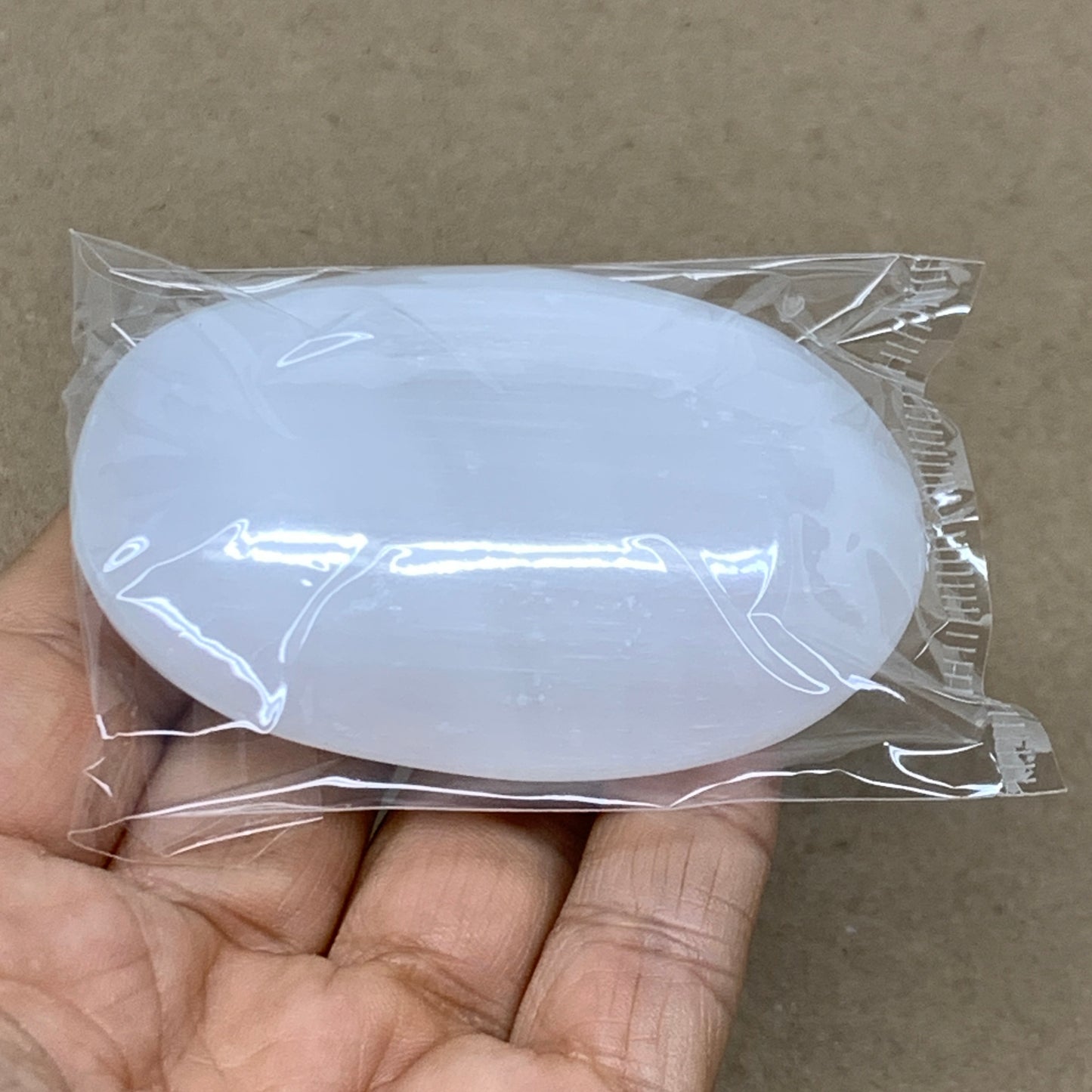 88g, 2.8"x1.9"x0.9", White Selenite Palmstone Crystal Pillow Reiki, B36396