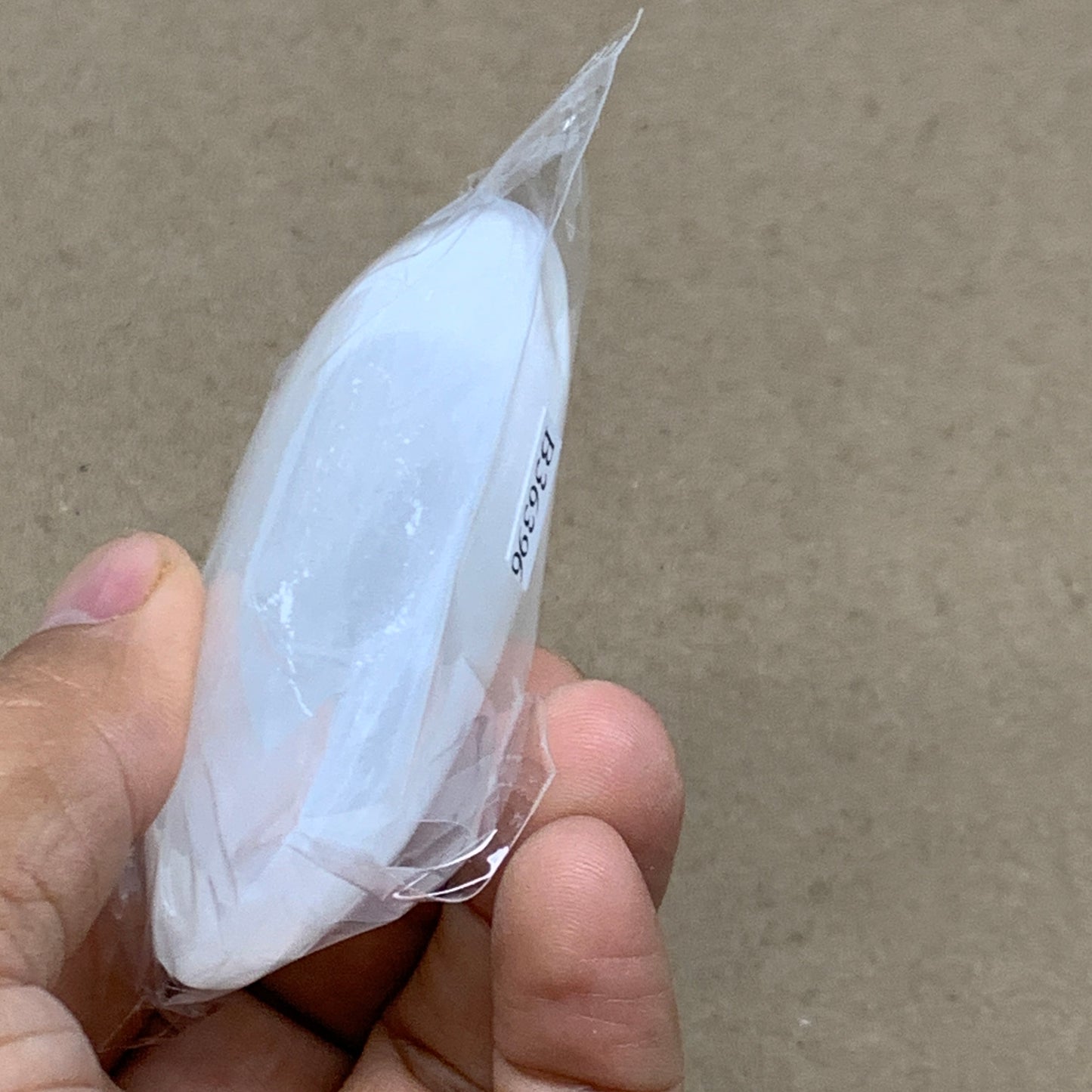 88g, 2.8"x1.9"x0.9", White Selenite Palmstone Crystal Pillow Reiki, B36396