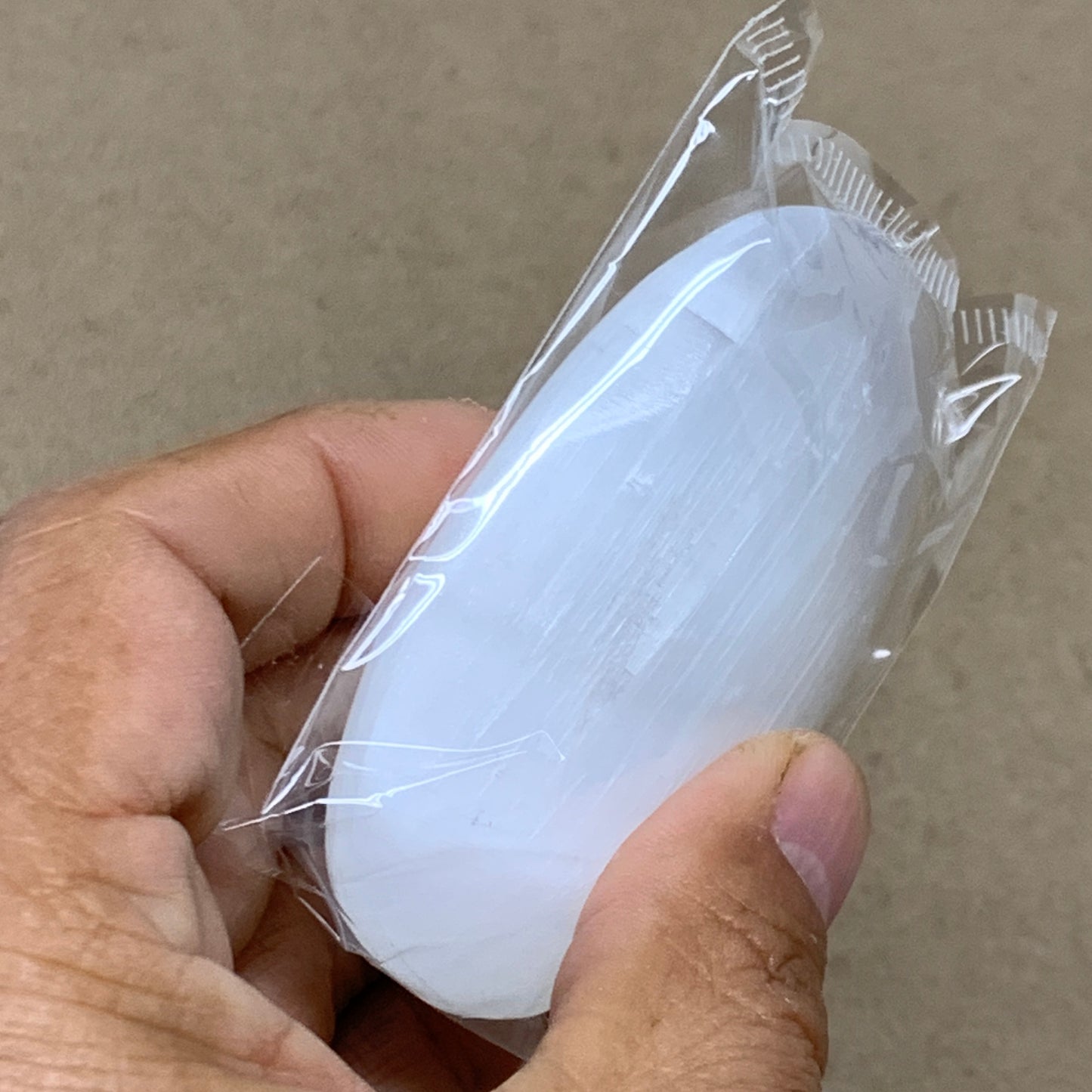 88g, 2.8"x1.9"x0.9", White Selenite Palmstone Crystal Pillow Reiki, B36396