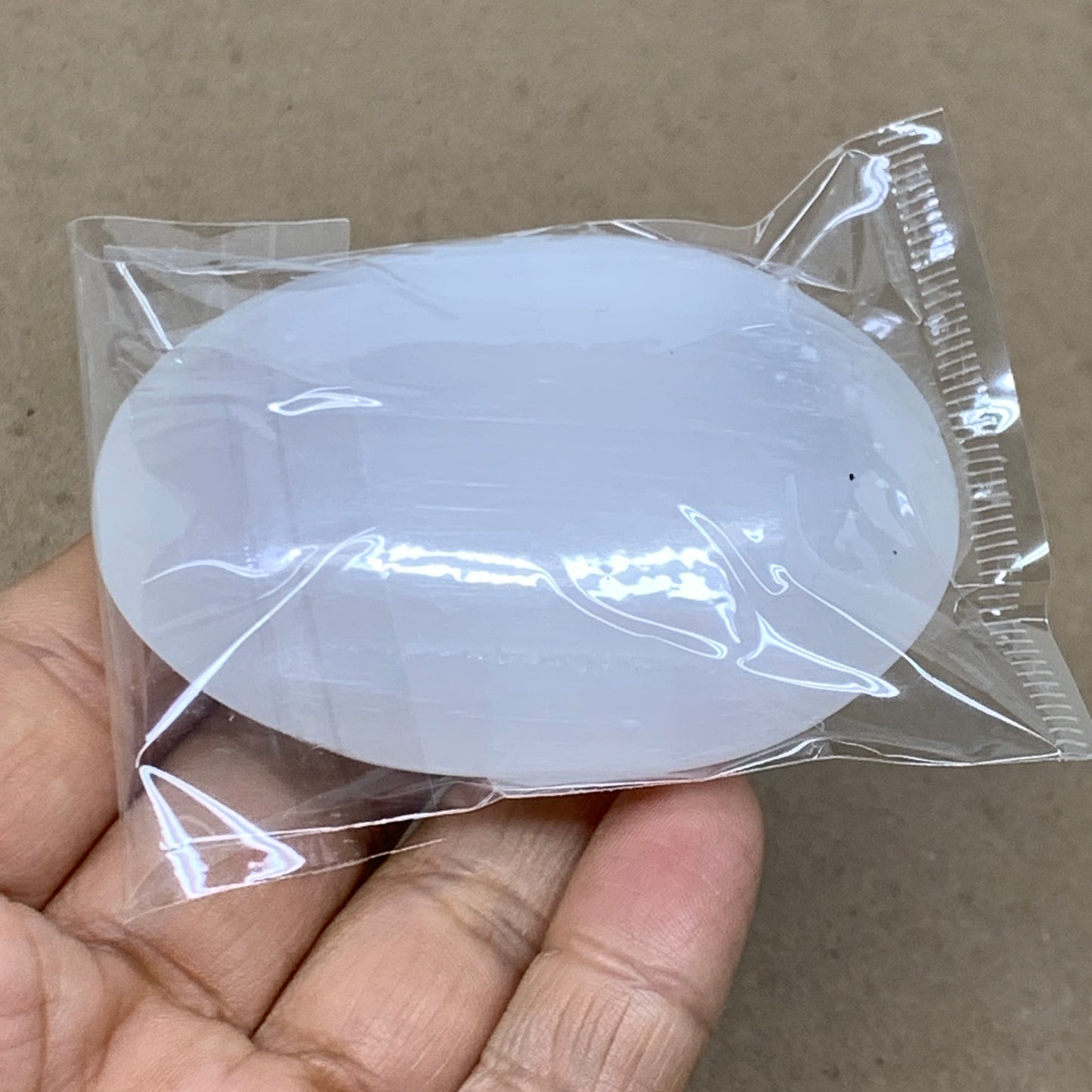 91g, 2.7"x1.9"x0.9", White Selenite Palmstone Crystal Pillow Reiki, B36399