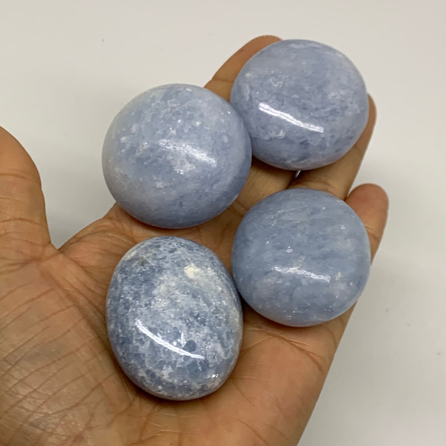 2.52 lbs, 1.5"-2", 17pcs, Blue Calcite Palm-Stone Polished Tumbled, B38149