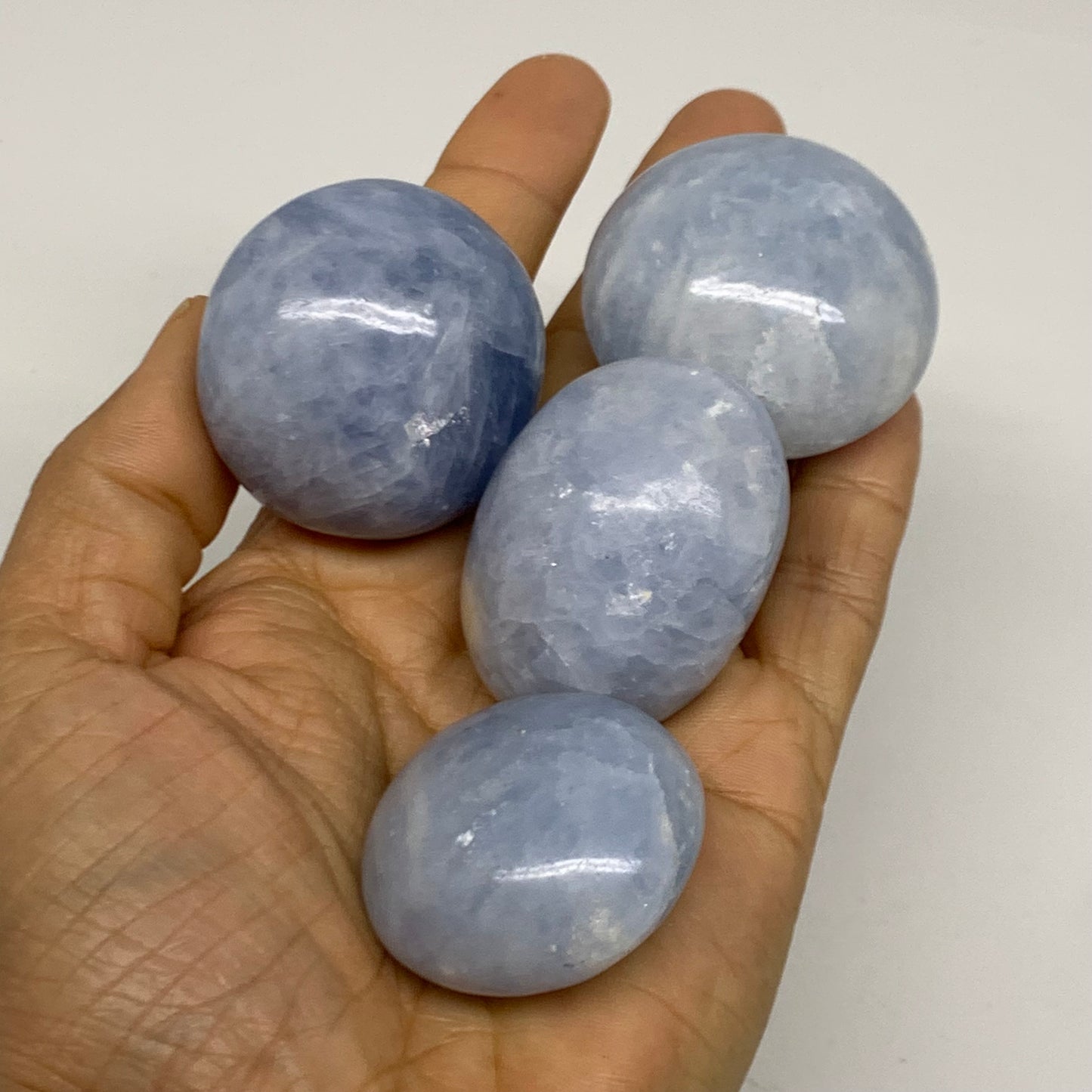 2.52 lbs, 1.5"-2", 17pcs, Blue Calcite Palm-Stone Polished Tumbled, B38149