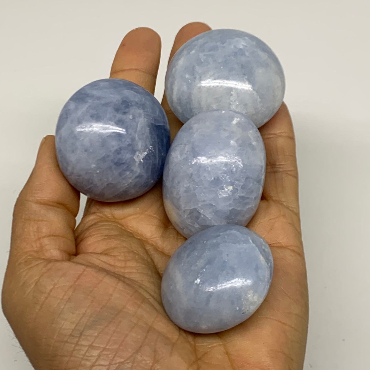 2.52 lbs, 1.5"-2", 17pcs, Blue Calcite Palm-Stone Polished Tumbled, B38149