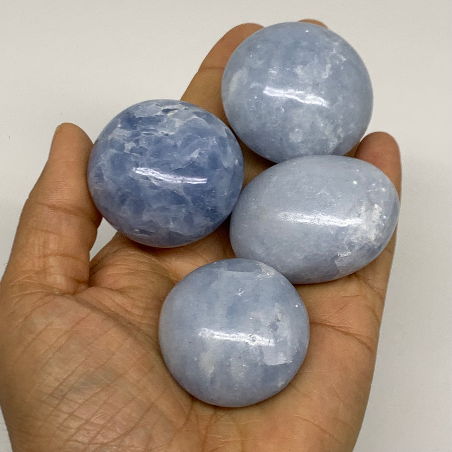2.52 lbs, 1.5"-2", 17pcs, Blue Calcite Palm-Stone Polished Tumbled, B38149
