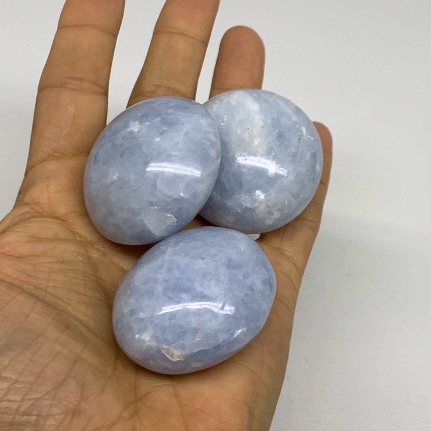 2.52 lbs, 1.5"-2", 17pcs, Blue Calcite Palm-Stone Polished Tumbled, B38149