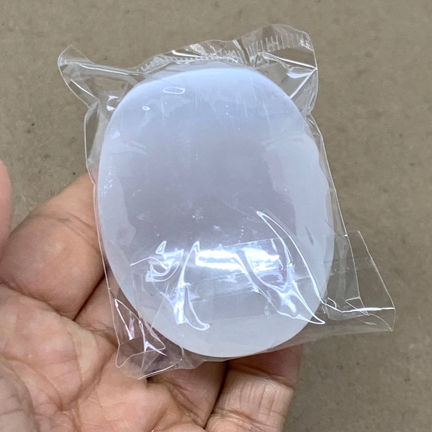 100g, 2.8"x1.9"x0.9", White Selenite Palmstone Crystal Pillow Reiki, B36404