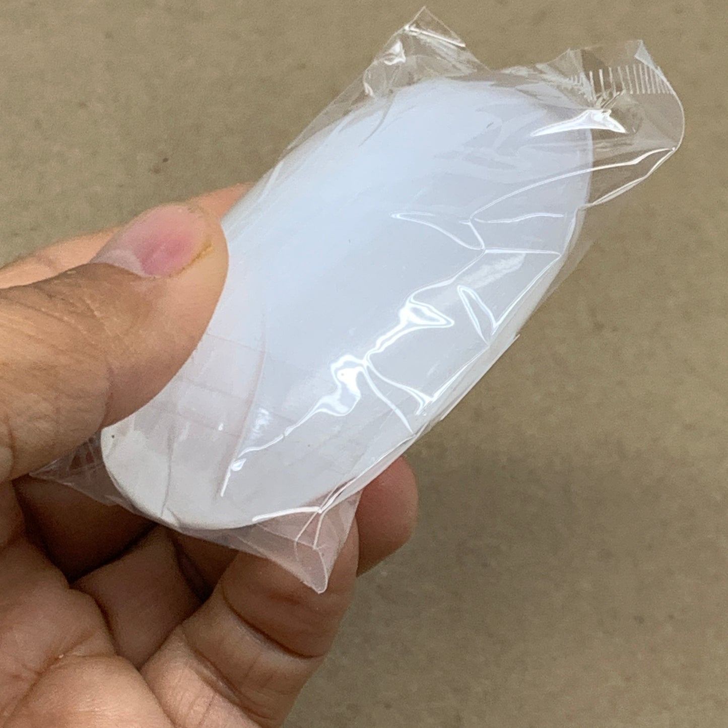 100g, 2.8"x1.9"x0.9", White Selenite Palmstone Crystal Pillow Reiki, B36404