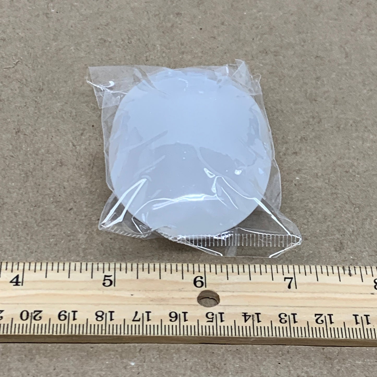 100g, 2.8"x1.9"x0.9", White Selenite Palmstone Crystal Pillow Reiki, B36404