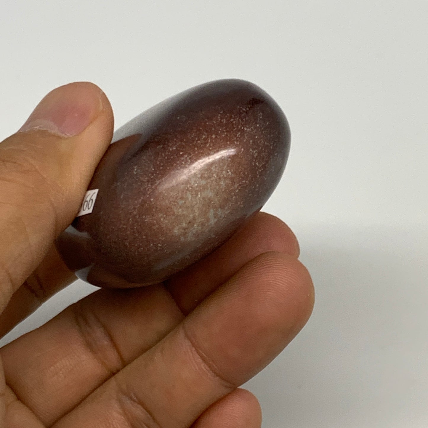 108.3g, 2.4"x1.7"x1", Narmada Shiva Lingam Palm-Stone Polished, B29366