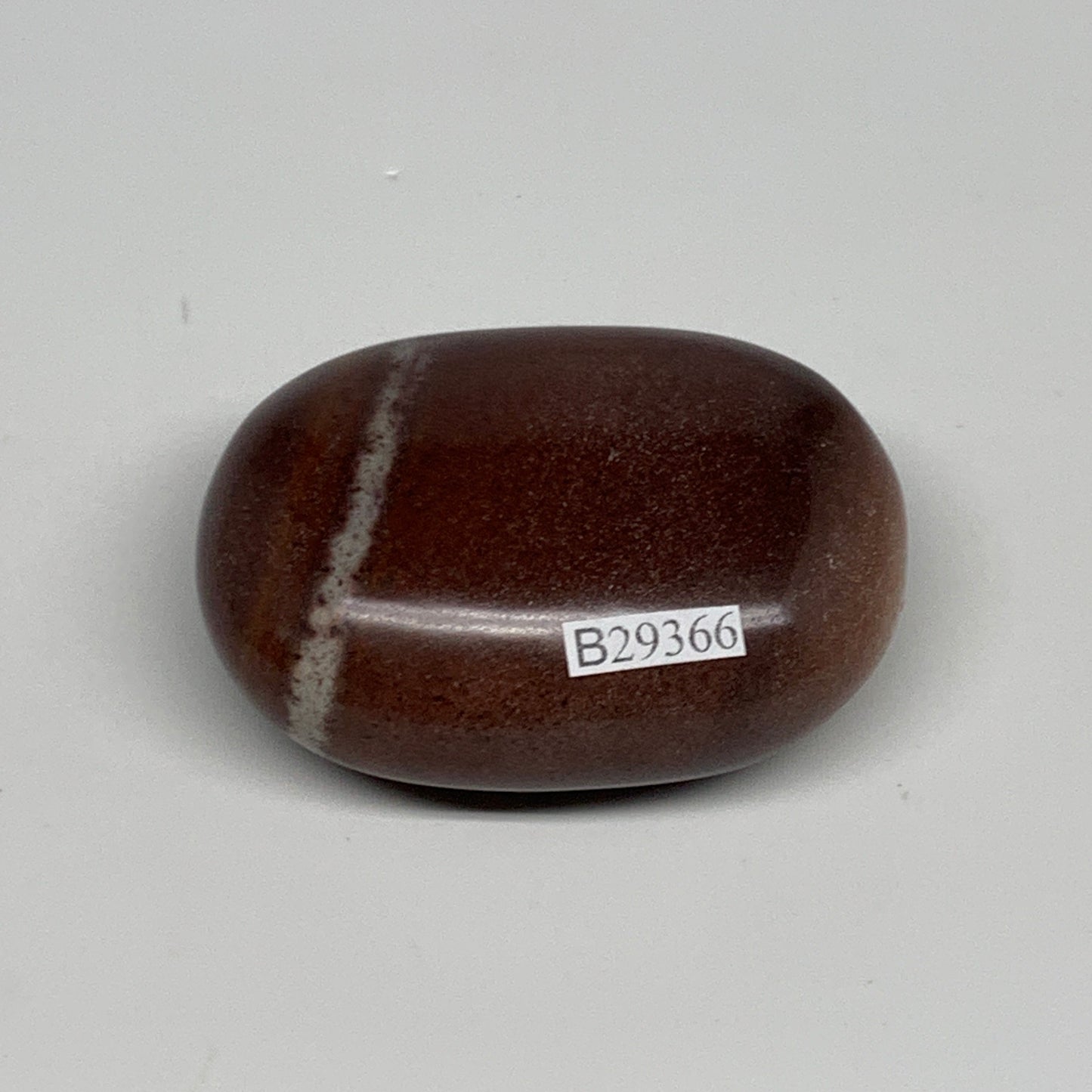 108.3g, 2.4"x1.7"x1", Narmada Shiva Lingam Palm-Stone Polished, B29366