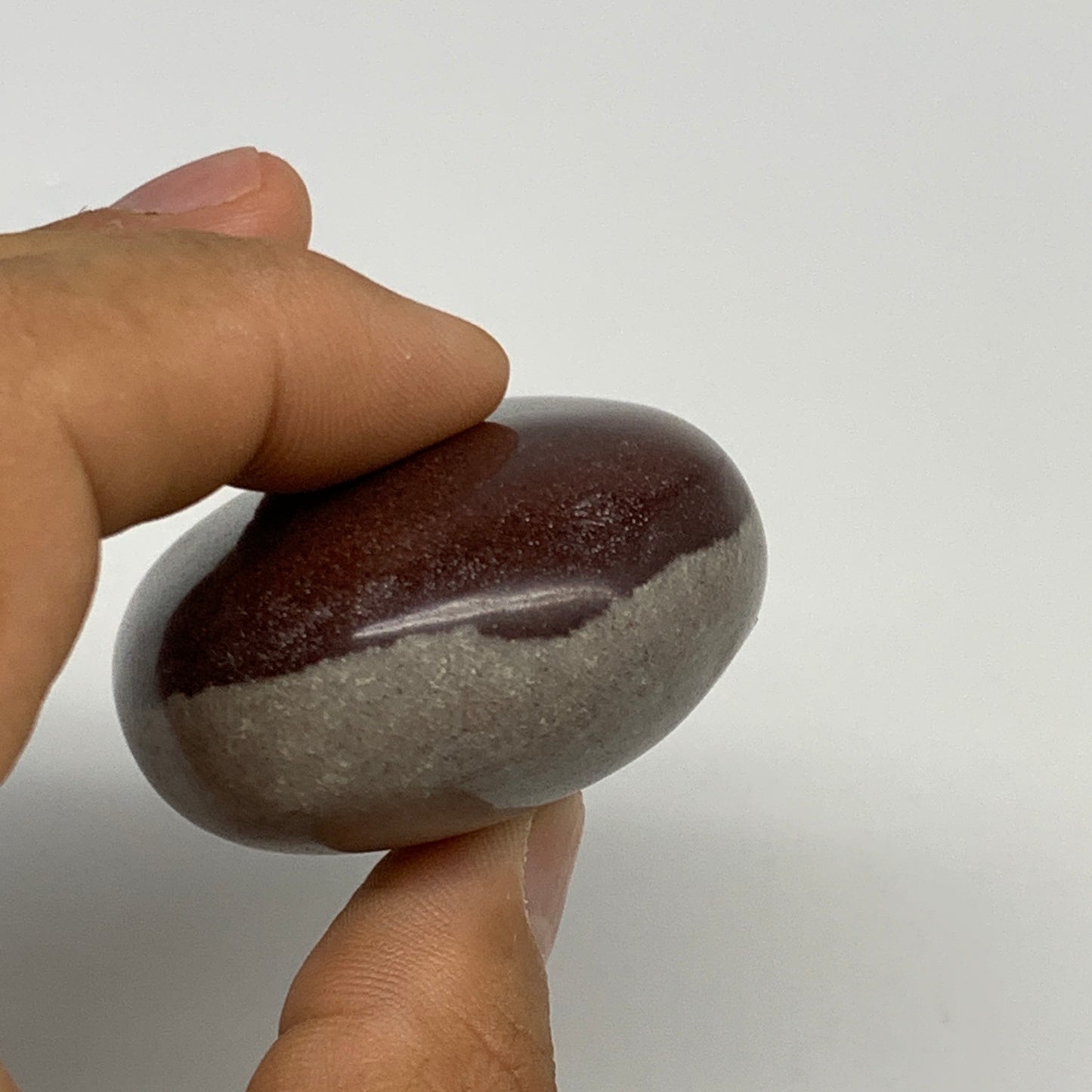 104.3g, 2.3"x1.8"x1", Narmada Shiva Lingam Palm-Stone Polished, B29365