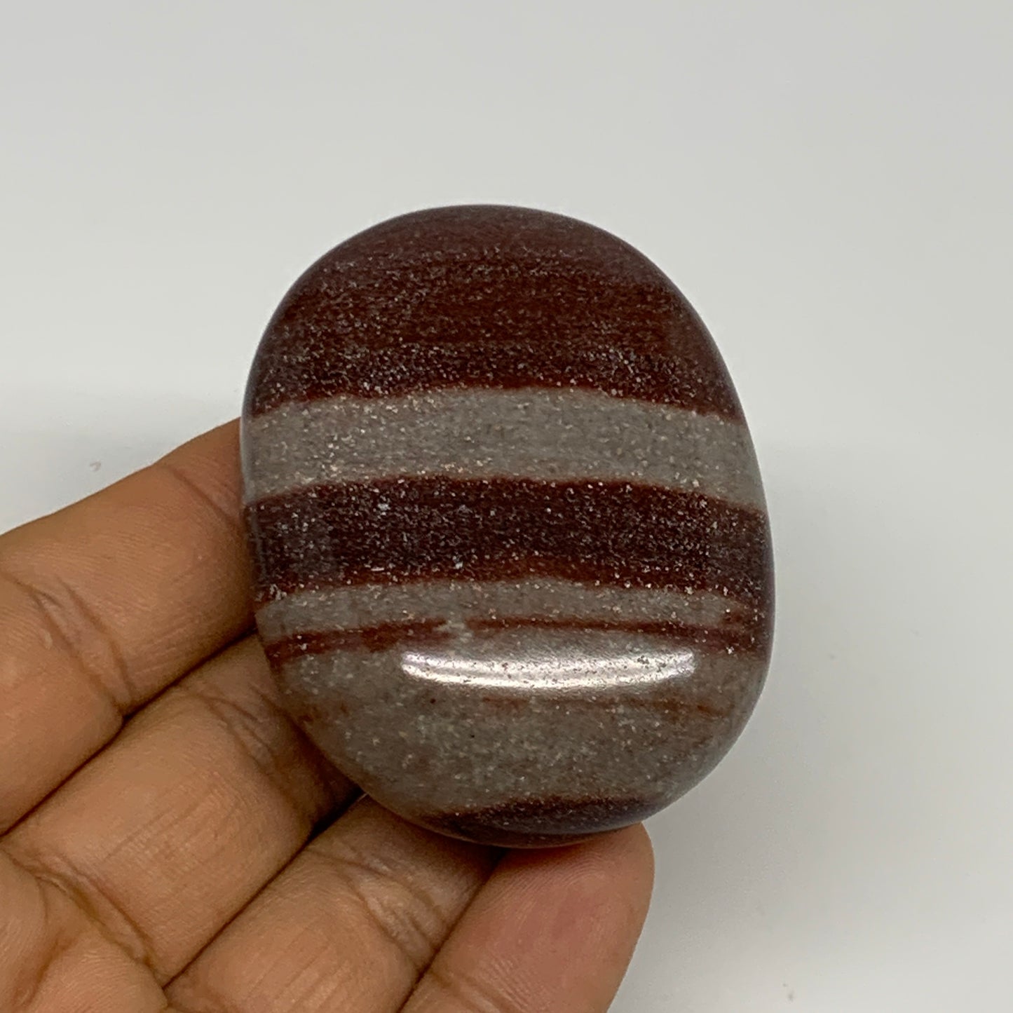 96g, 2.3"x1.8"x0.9", Narmada Shiva Lingam Palm-Stone Polished, B29361