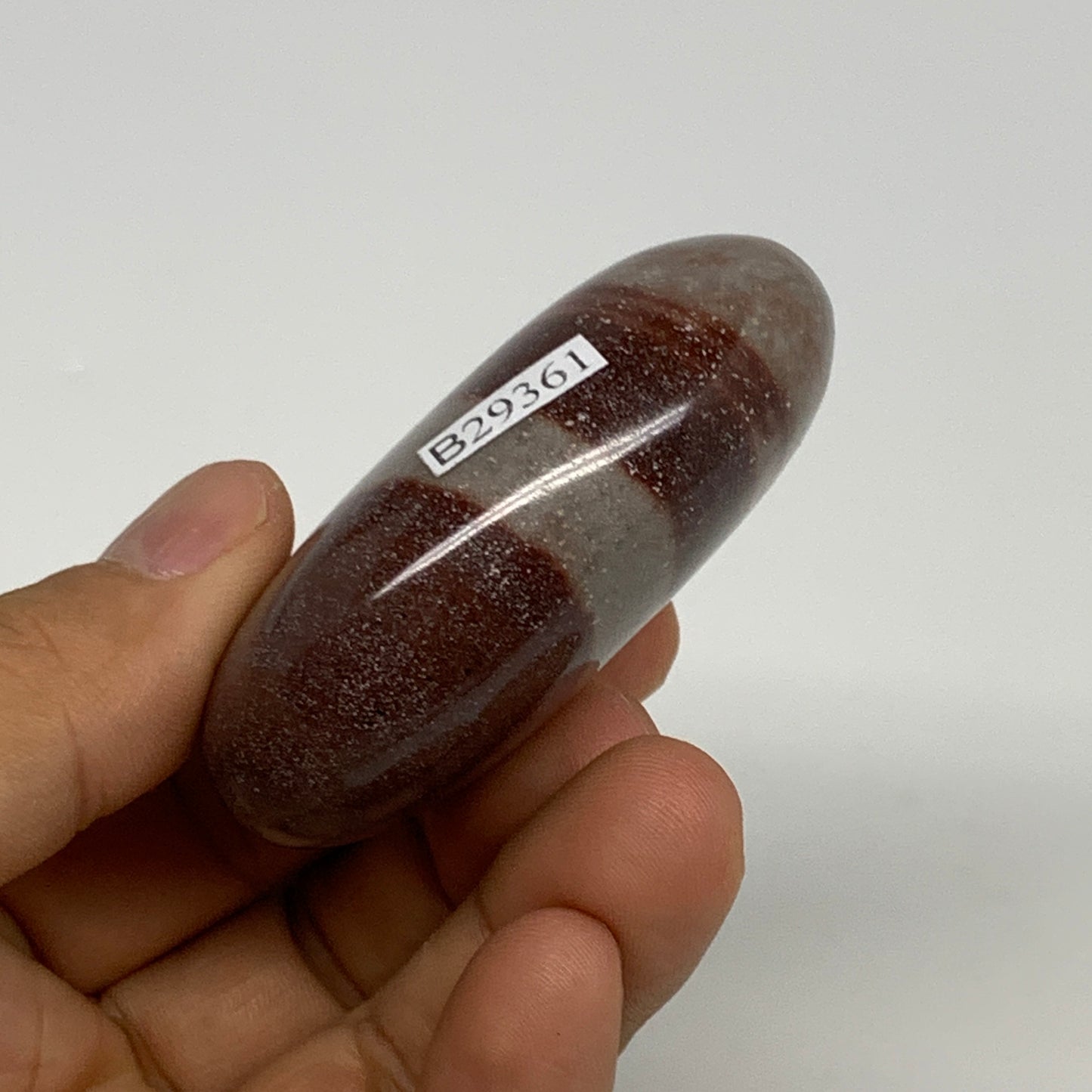 96g, 2.3"x1.8"x0.9", Narmada Shiva Lingam Palm-Stone Polished, B29361