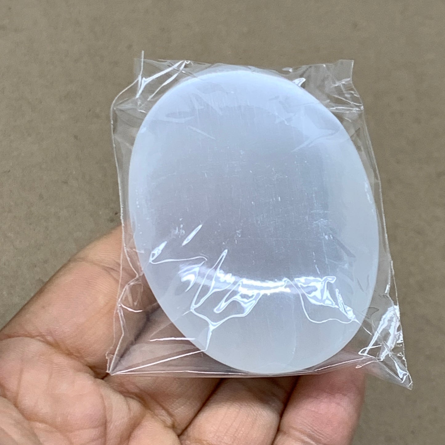 91g, 2.8"x2x0.9", White Selenite Palmstone Crystal Pillow Reiki, B36411