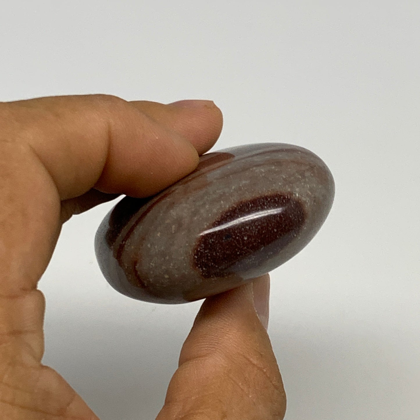 96g, 2.3"x1.8"x0.9", Narmada Shiva Lingam Palm-Stone Polished, B29361