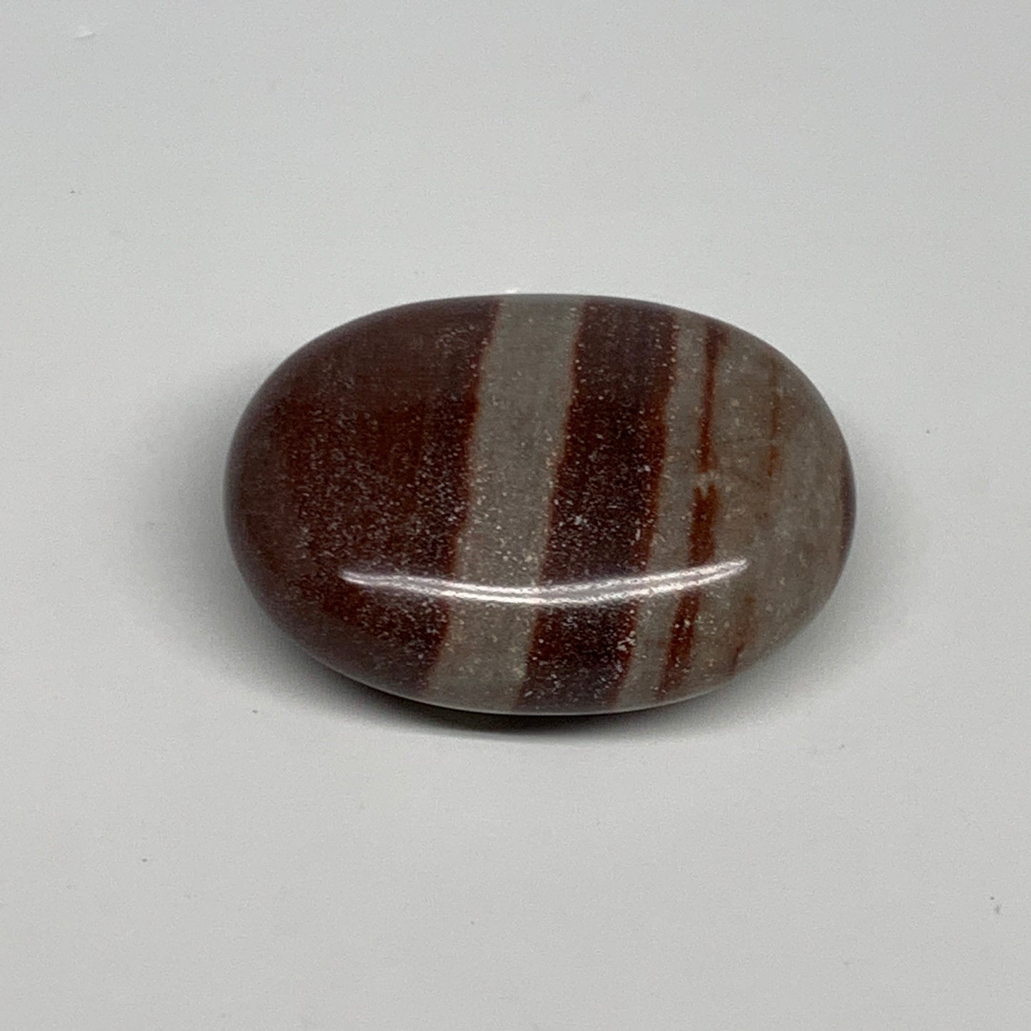 96g, 2.3"x1.8"x0.9", Narmada Shiva Lingam Palm-Stone Polished, B29361