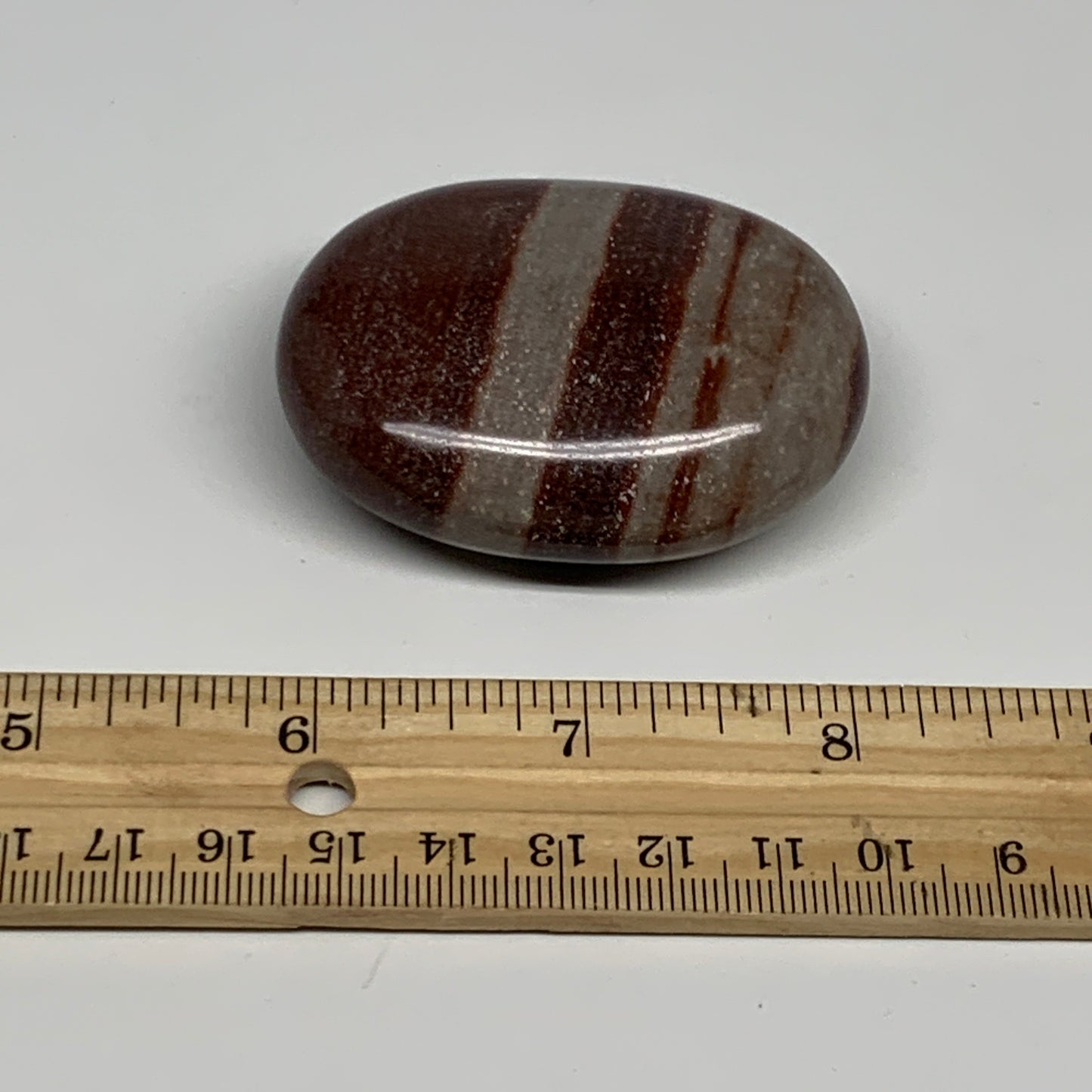 96g, 2.3"x1.8"x0.9", Narmada Shiva Lingam Palm-Stone Polished, B29361