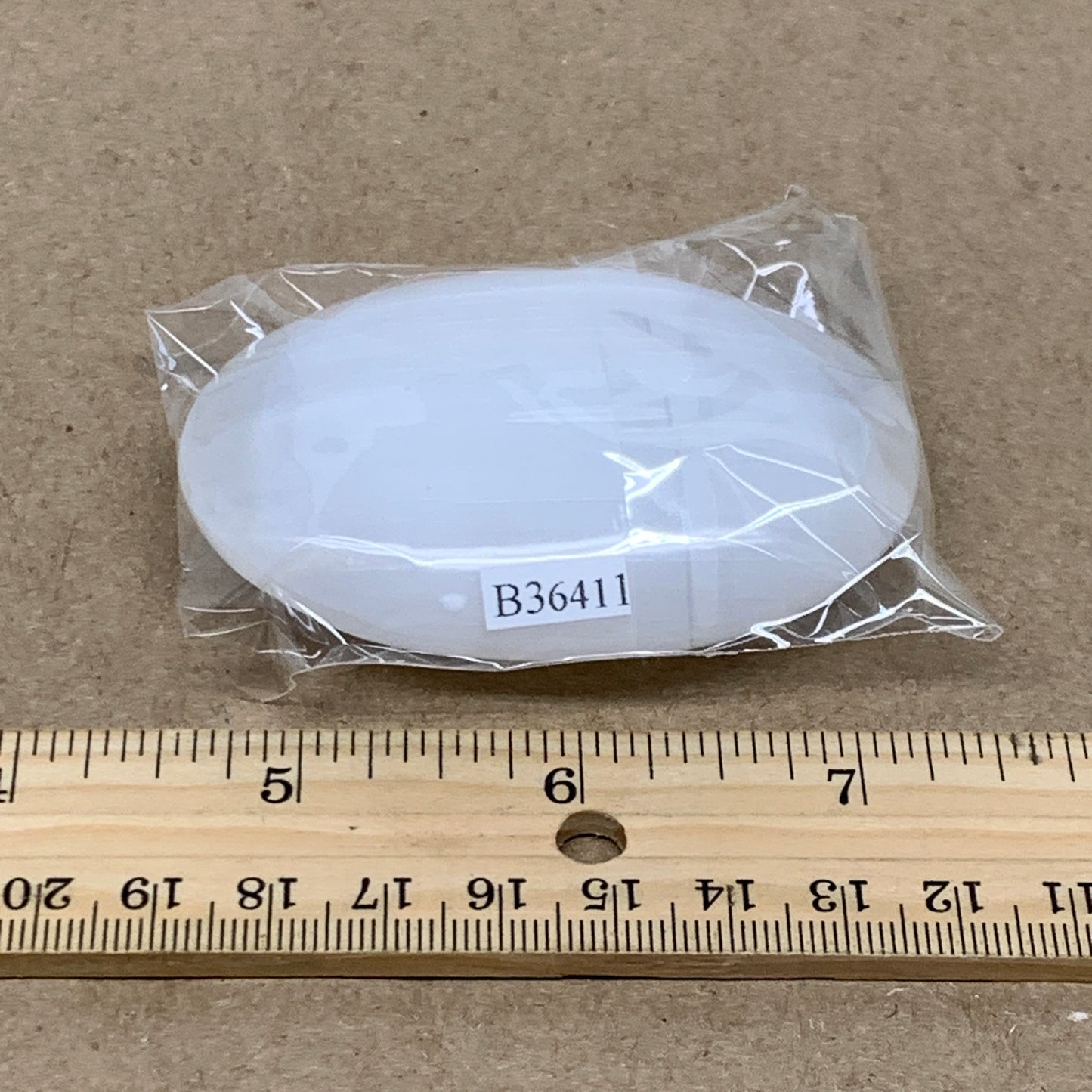 91g, 2.8"x2x0.9", White Selenite Palmstone Crystal Pillow Reiki, B36411