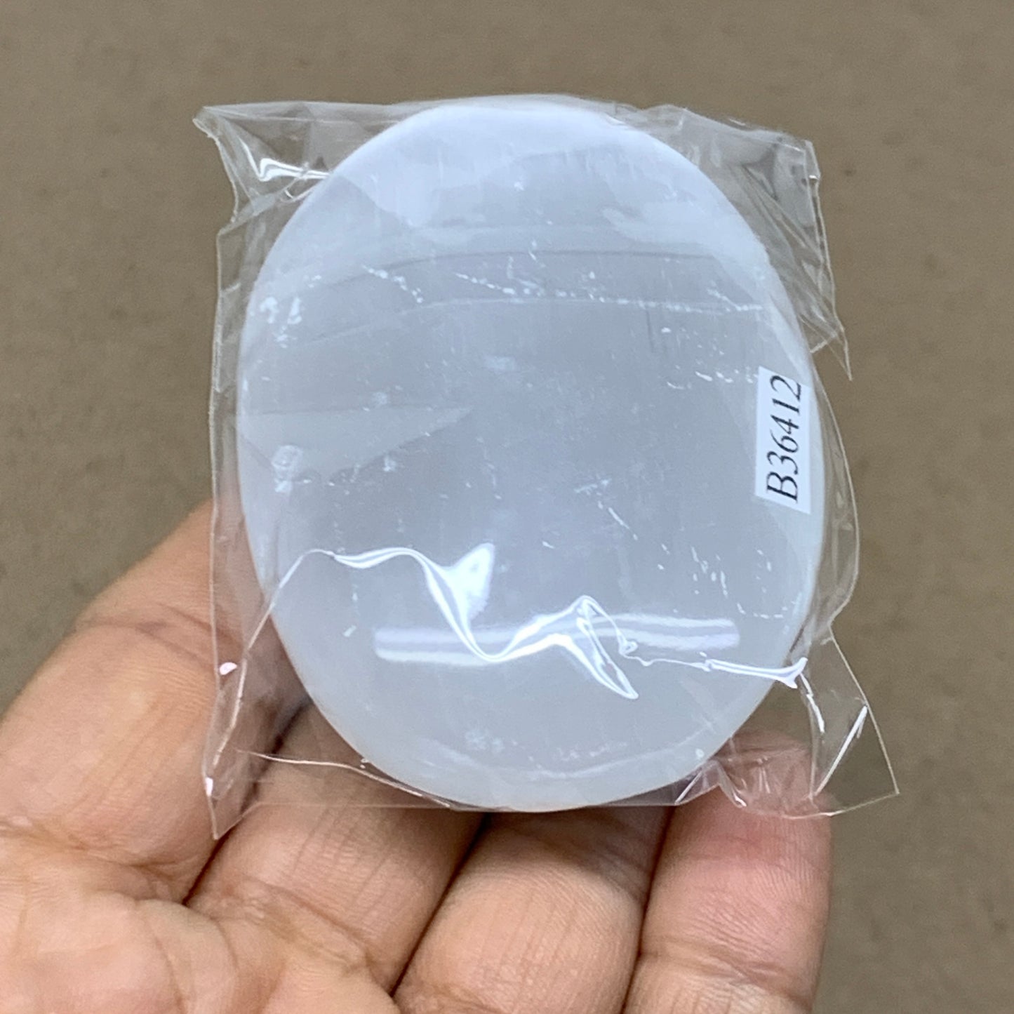 93g, 2.8"x1.9"x0.9", White Selenite Palmstone Crystal Pillow Reiki, B36412