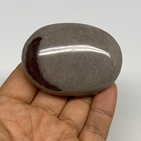 98.6g, 2.4"x1.7"x0.9", Narmada Shiva Lingam Palm-Stone Polished, B29375