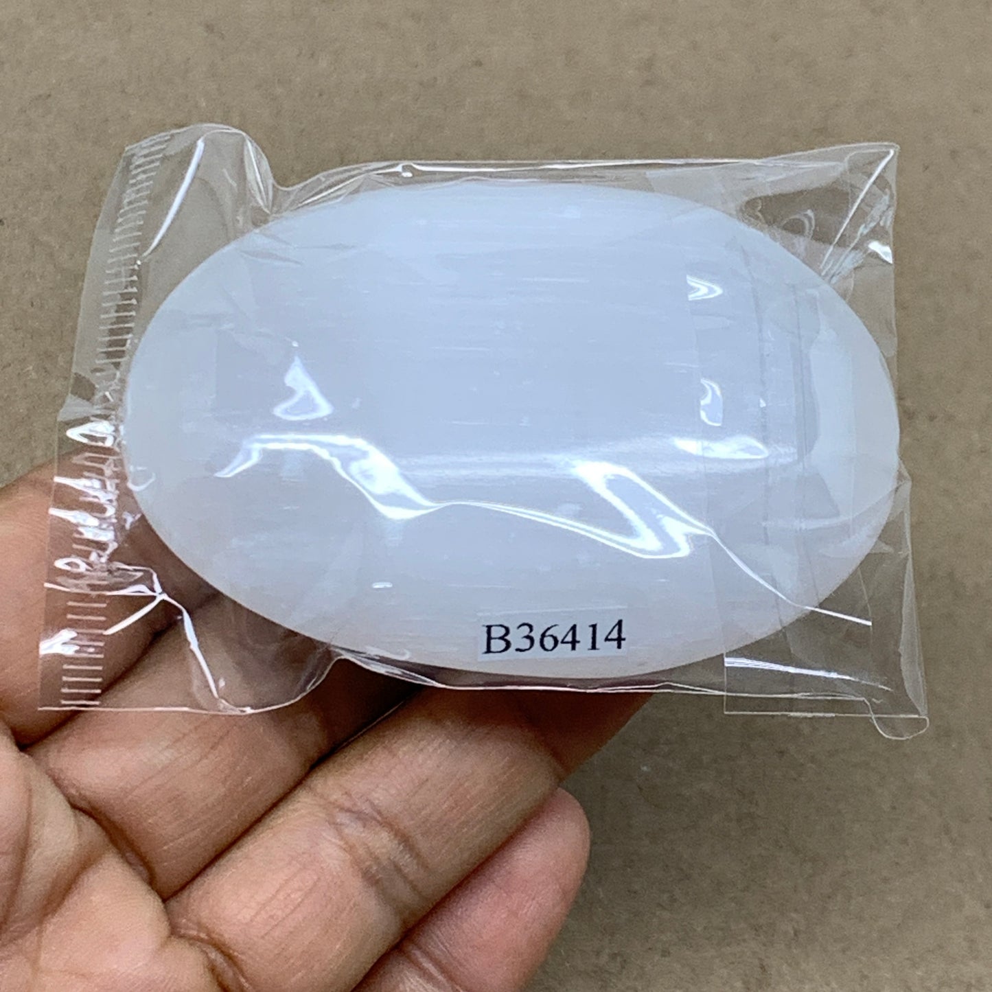 96g, 2.8"x1.9"x0.9", White Selenite Palmstone Crystal Pillow Reiki, B36414