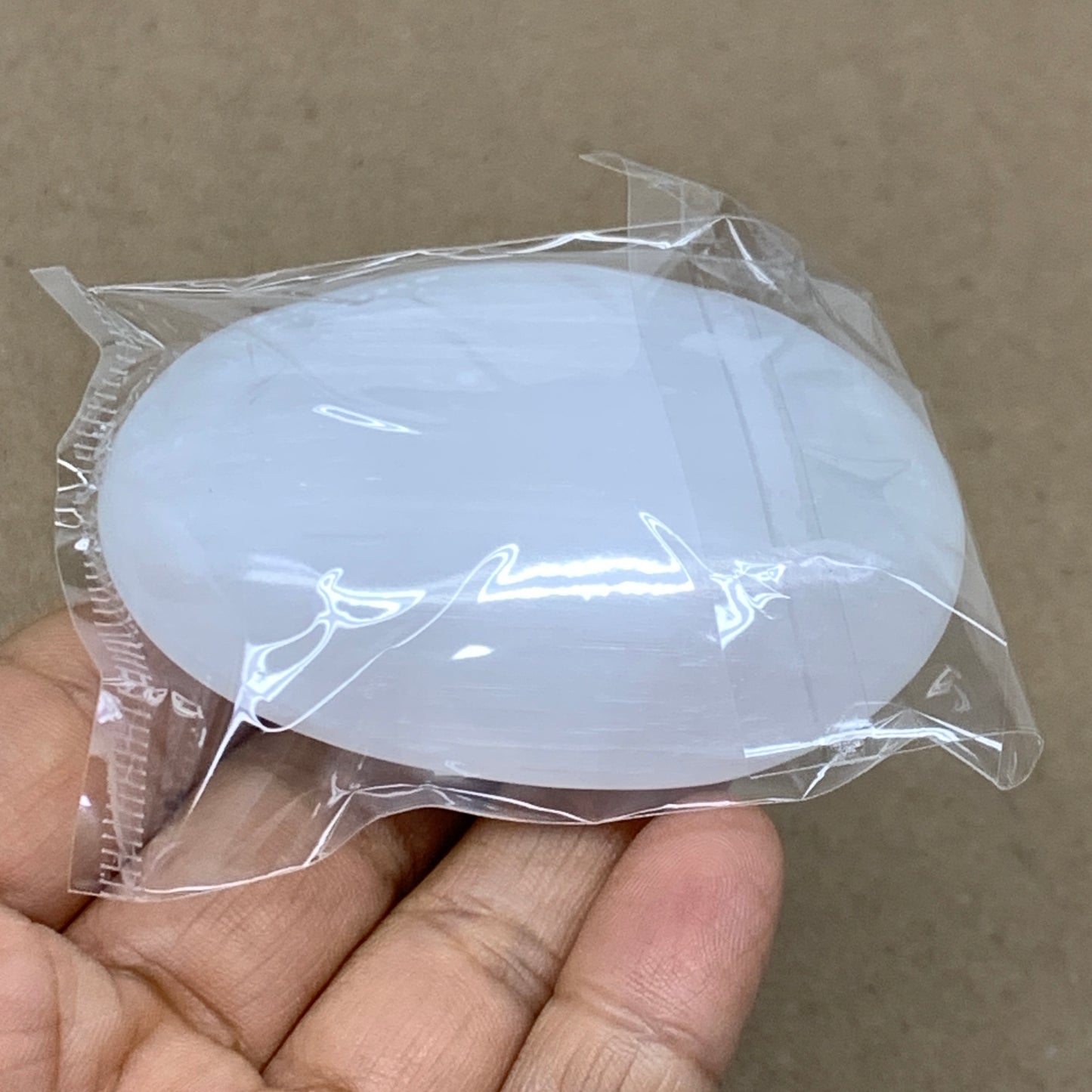 83g, 2.7"x1.9"x0.9", White Selenite Palmstone Crystal Pillow Reiki, B36415