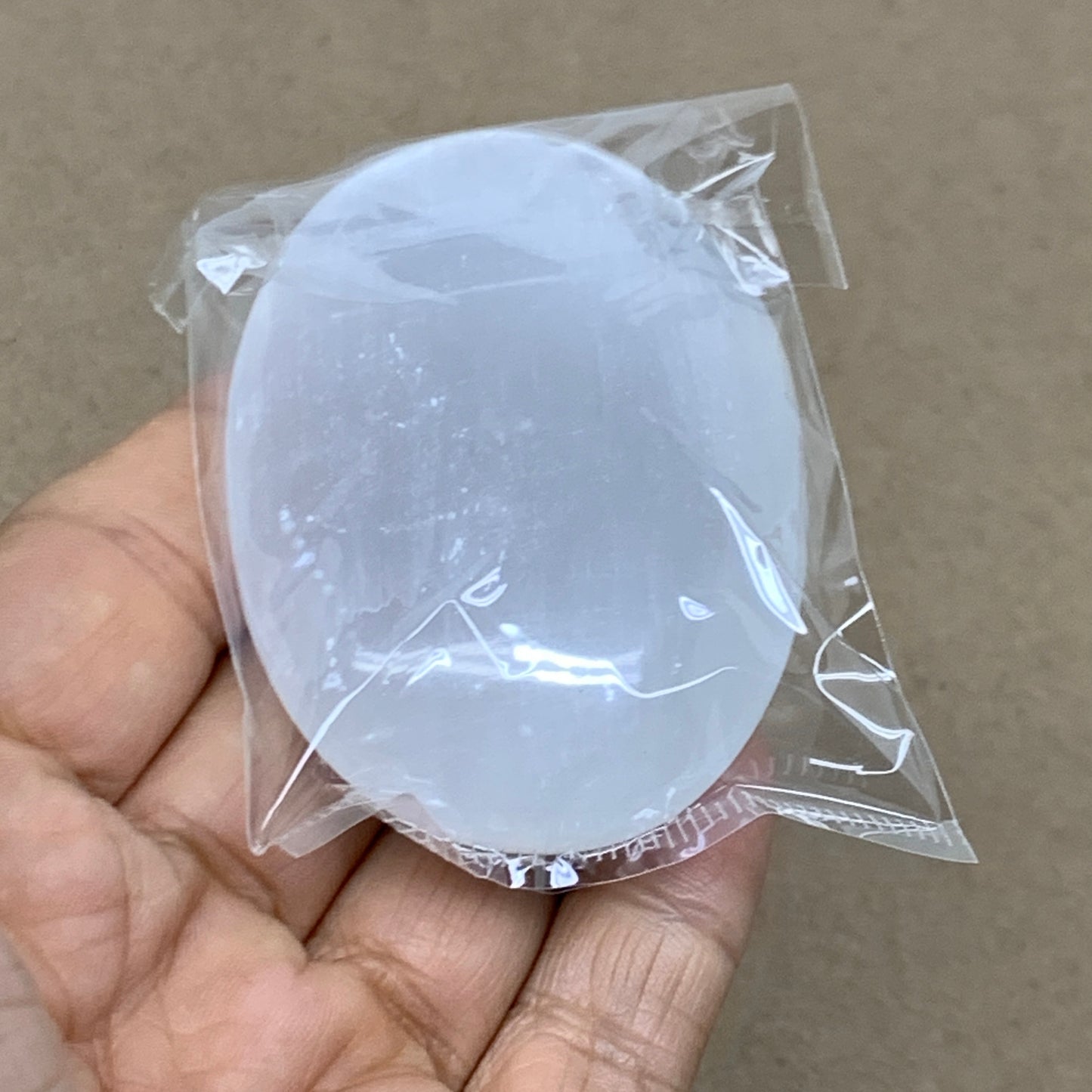 83g, 2.7"x1.9"x0.9", White Selenite Palmstone Crystal Pillow Reiki, B36415