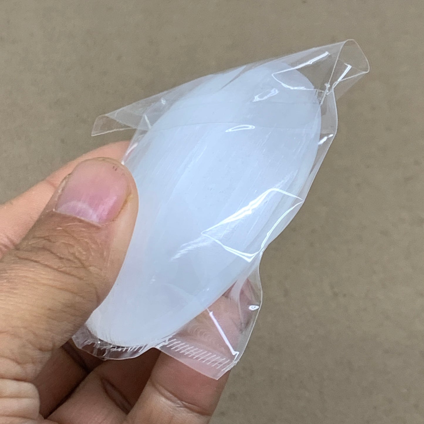 83g, 2.7"x1.9"x0.9", White Selenite Palmstone Crystal Pillow Reiki, B36415