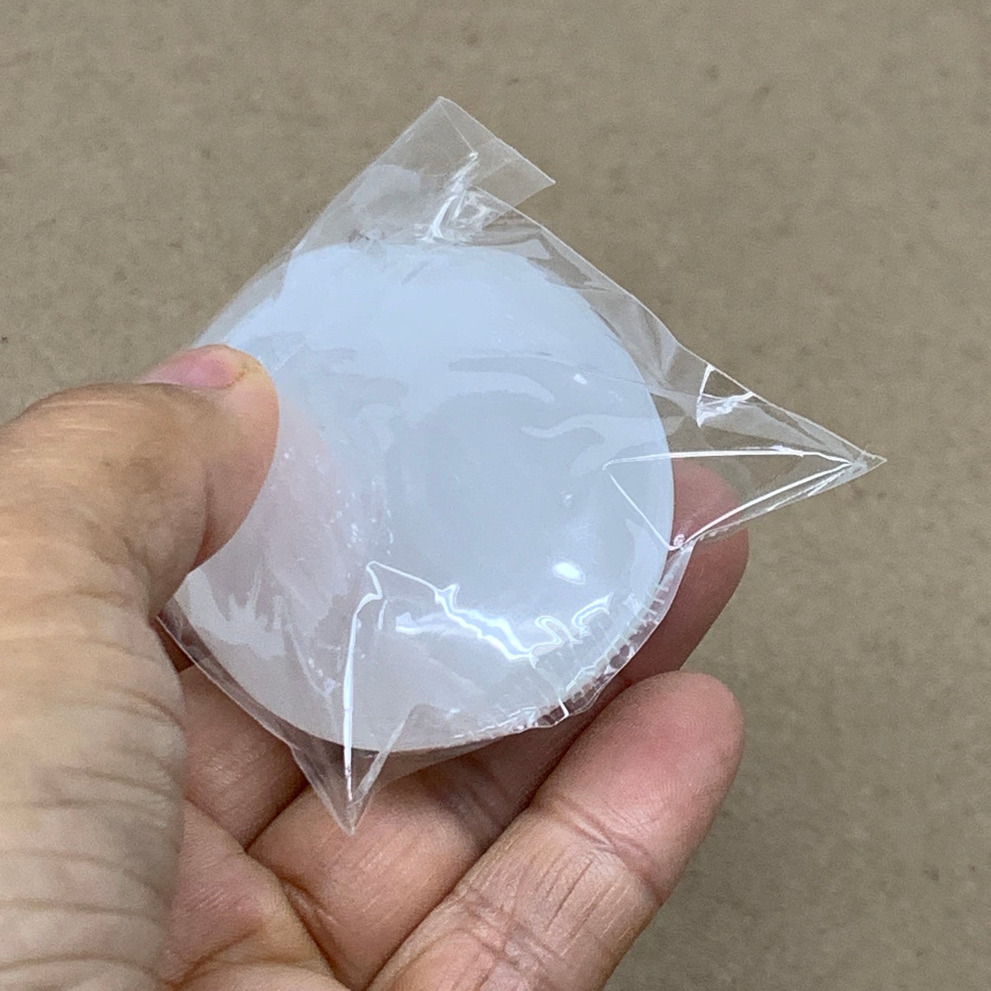 83g, 2.7"x1.9"x0.9", White Selenite Palmstone Crystal Pillow Reiki, B36415