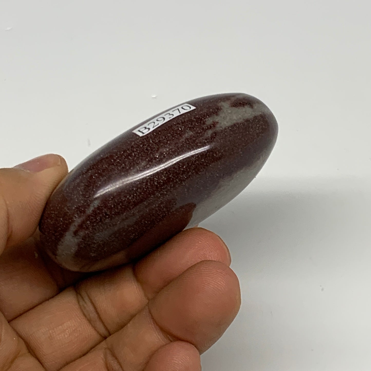 107.3g, 2.4"x1.8"x1", Narmada Shiva Lingam Palm-Stone Polished, B29370