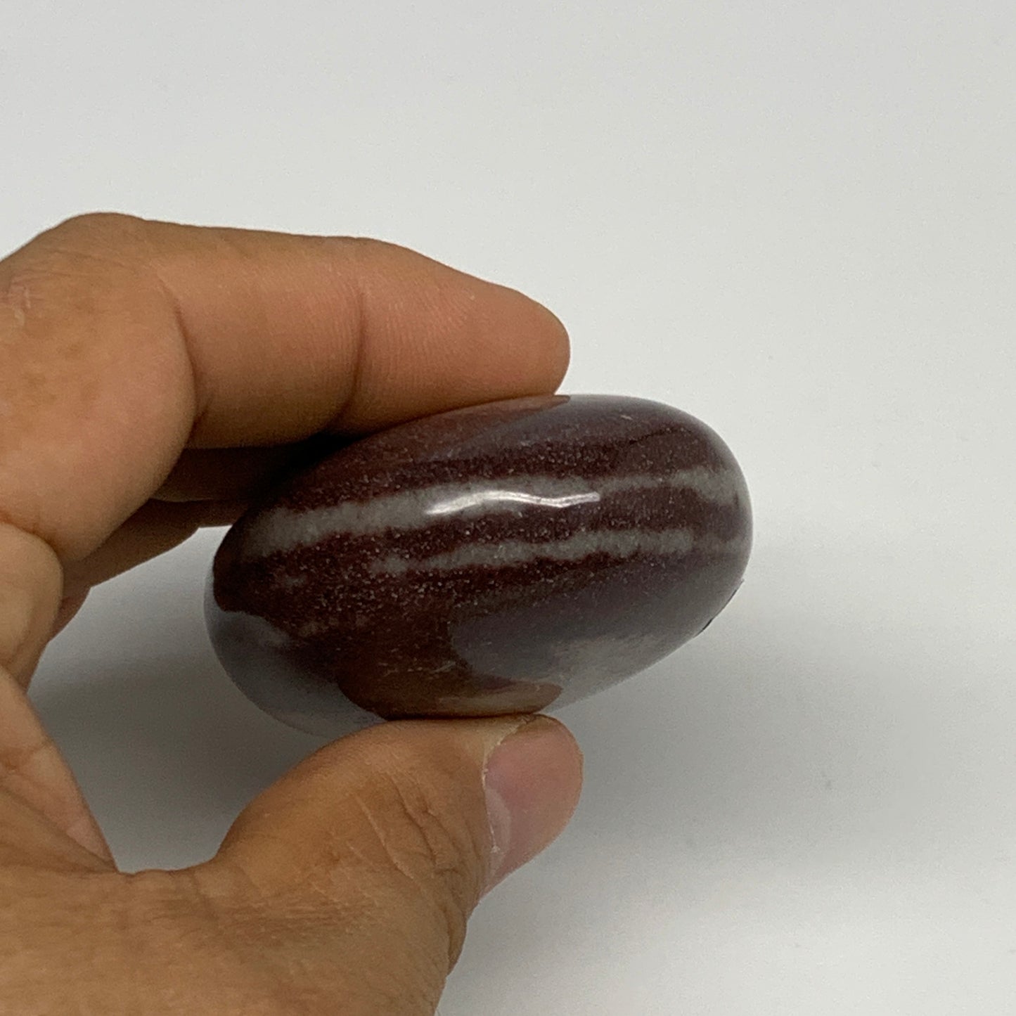 107.3g, 2.4"x1.8"x1", Narmada Shiva Lingam Palm-Stone Polished, B29370