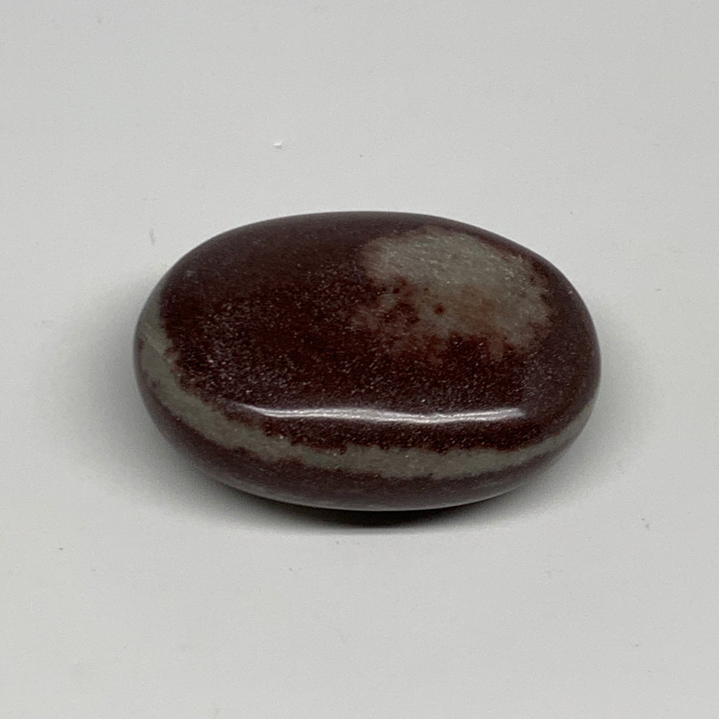 107.3g, 2.4"x1.8"x1", Narmada Shiva Lingam Palm-Stone Polished, B29370