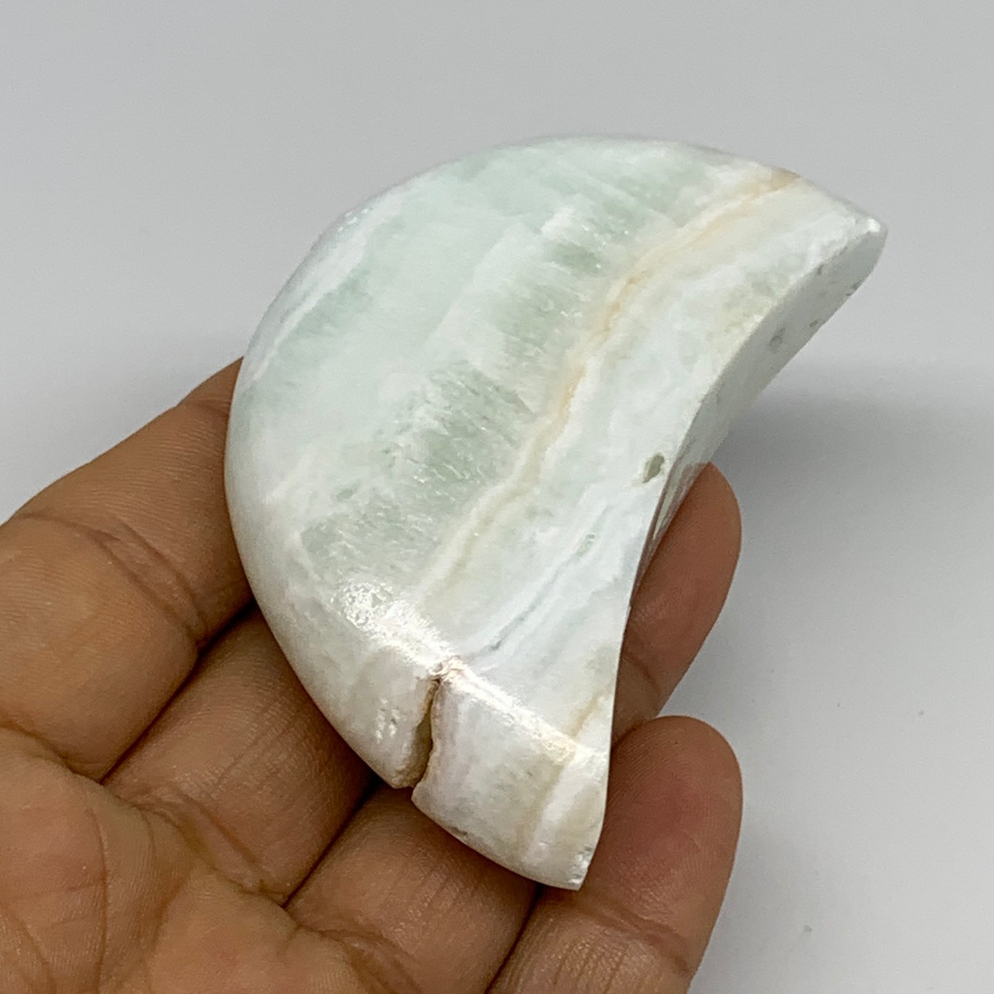 107.5g, 2.8"x1.5"x0.9", Caribbean Calcite Moon Crescent Gemstone, B33676
