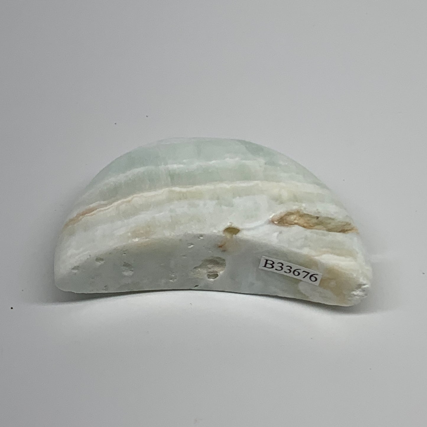 107.5g, 2.8"x1.5"x0.9", Caribbean Calcite Moon Crescent Gemstone, B33676