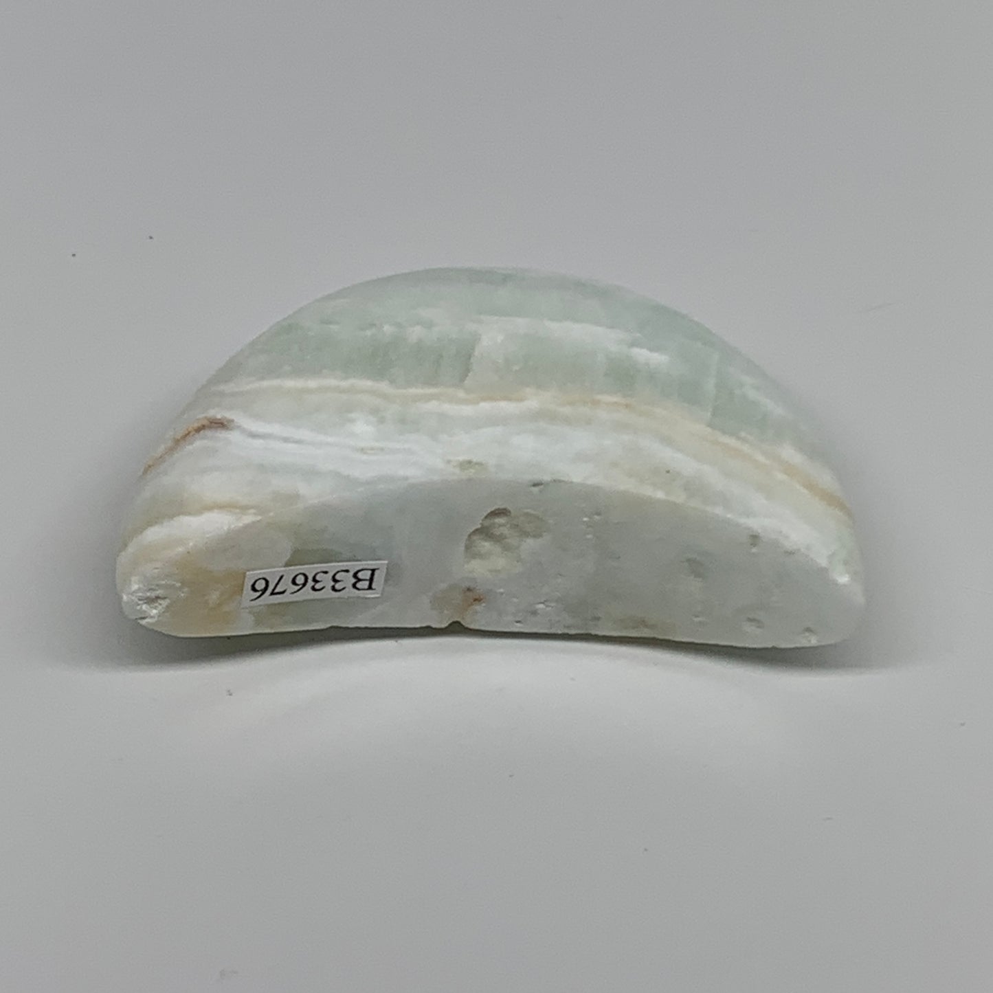 107.5g, 2.8"x1.5"x0.9", Caribbean Calcite Moon Crescent Gemstone, B33676