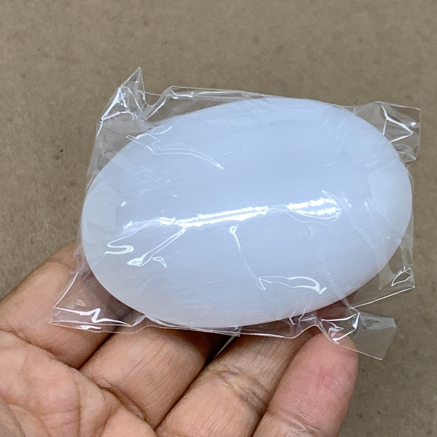 88g, 2.7"x1.9"x0.9", White Selenite Palmstone Crystal Pillow Reiki, B36421