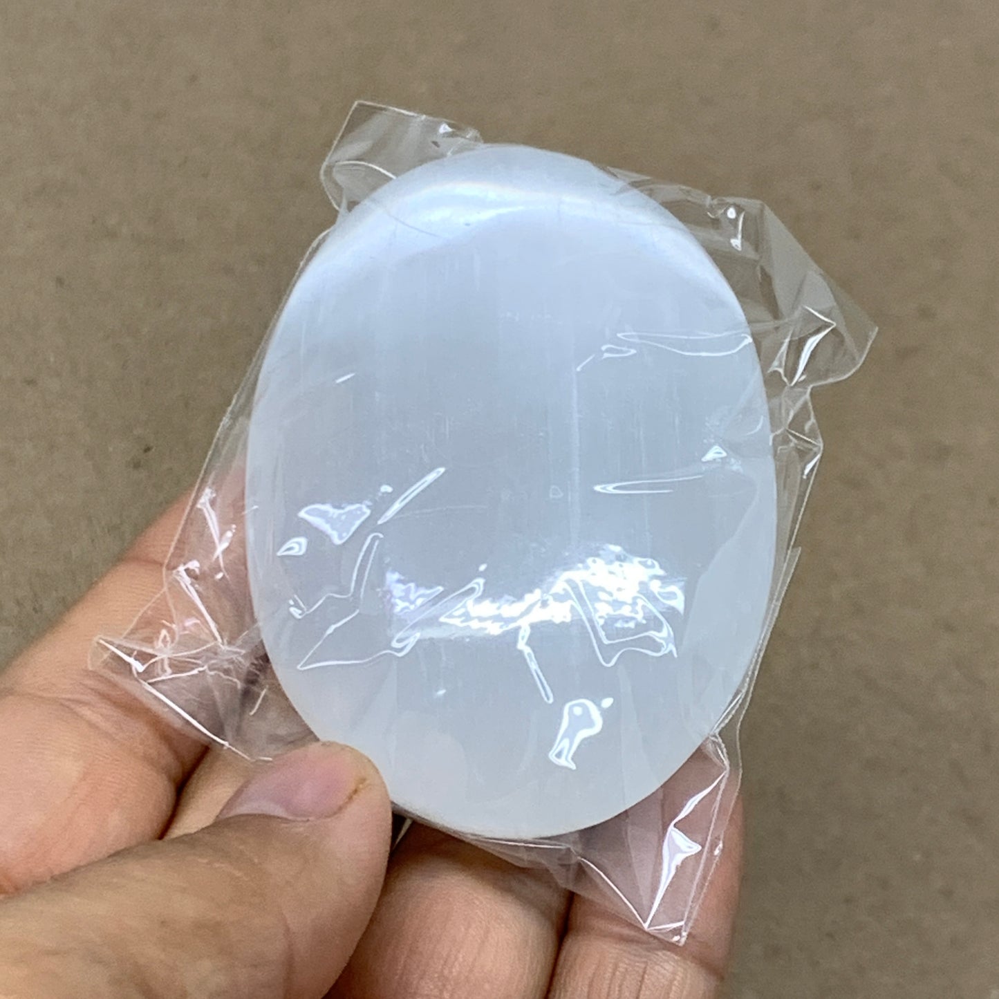 88g, 2.7"x1.9"x0.9", White Selenite Palmstone Crystal Pillow Reiki, B36421